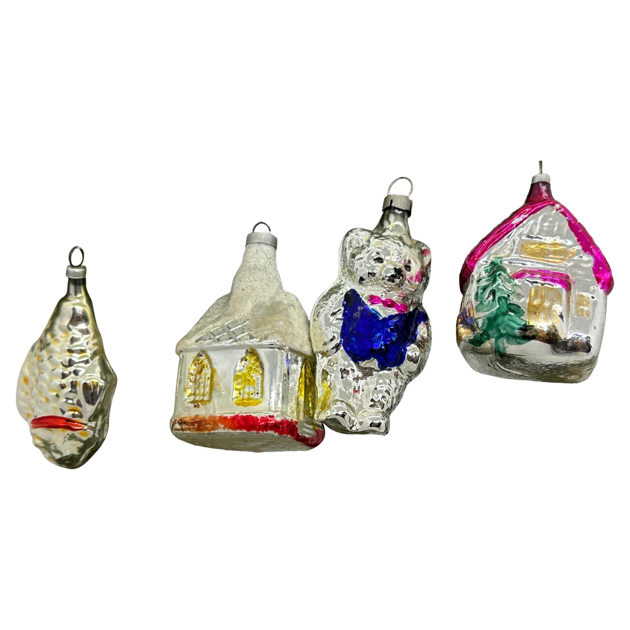 A rare Christmas ornament set of four. Each is made from mouth blown glass, this would be a great addition for your Christmas or feather tree. Size always given for the tallest item in the pictures. Age approx. 1930s, sometimes older.
 