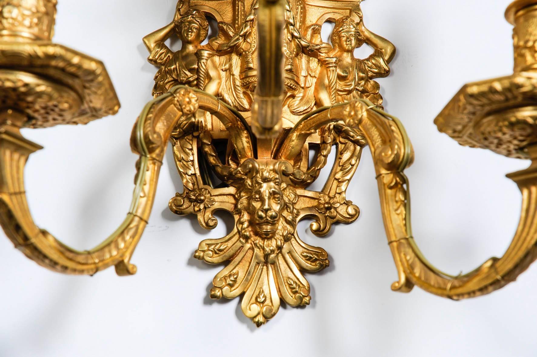 Gilt Rare Set of Four Louis XIV Bronze Sconces For Sale