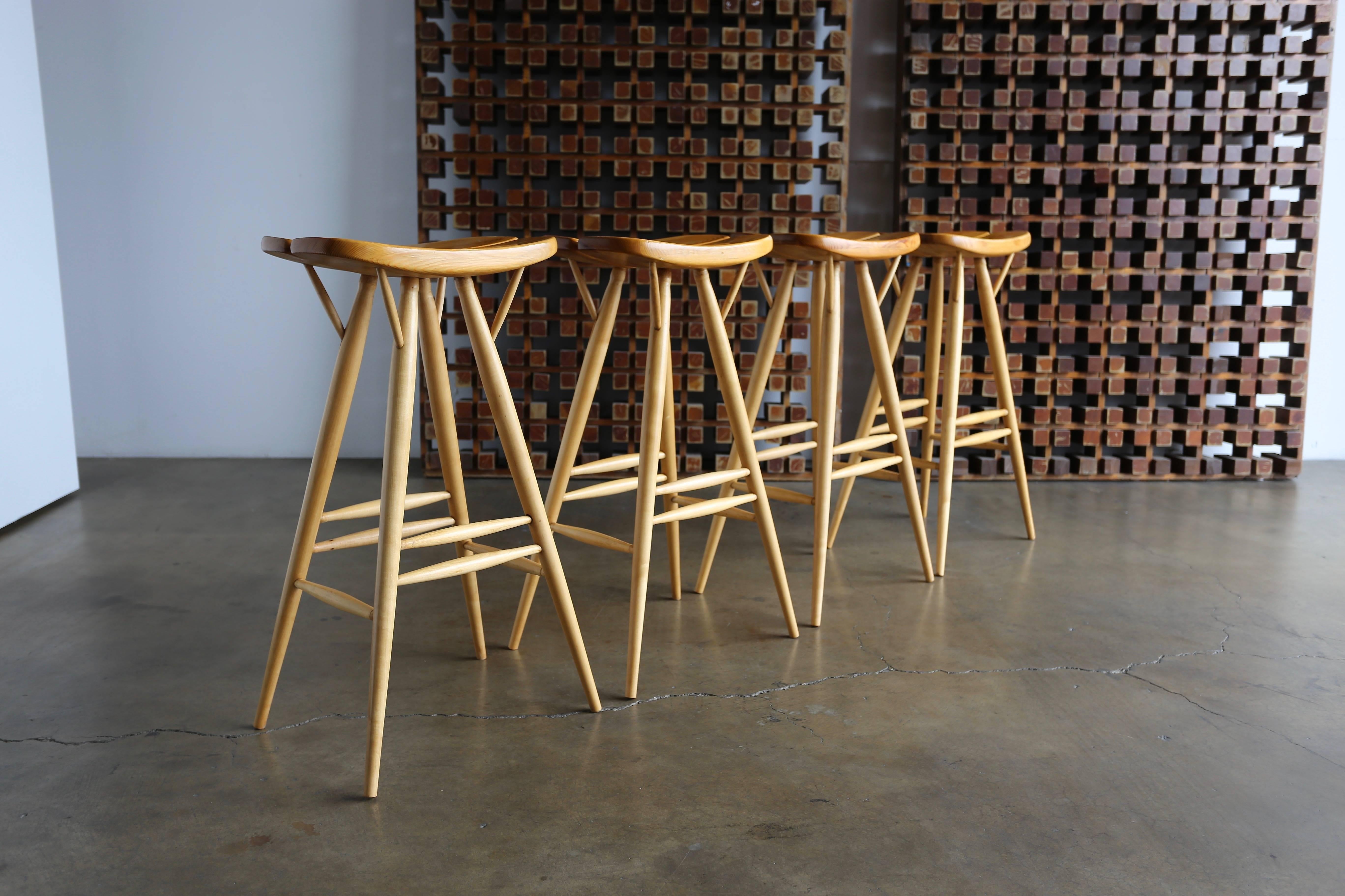 Rare early set of four stools by Ilmari Tapiovaara for Laukaan Puu, Finland, circa 1955. 

The seat measures: 17