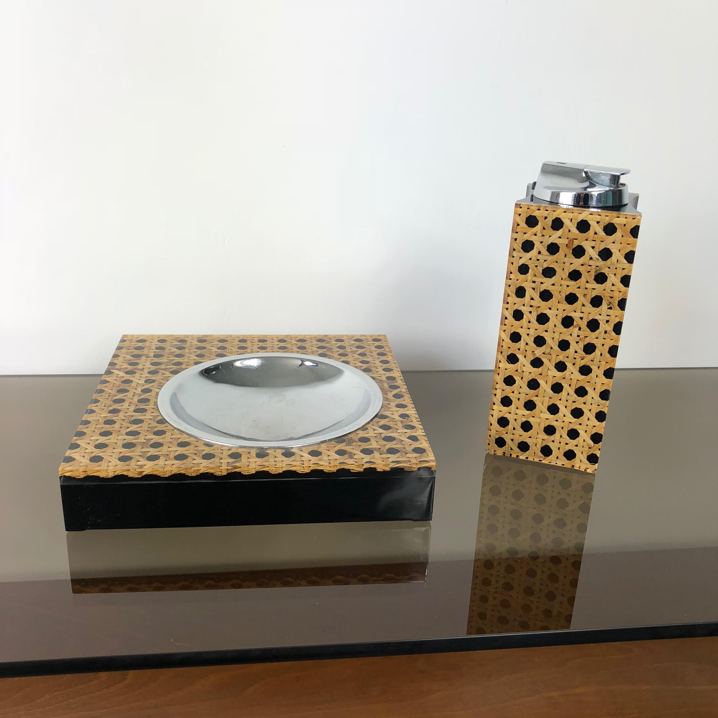 Rare set for smokers composed of a table-lighter and an ashtray designed by Felice Antonio Botta in the 1970s. Both the lighter and the ashtray have got the label. Measurements: Ashtray 17 x 17 x 3 cm, Lighter 17 x 6 x 6 cm.
 