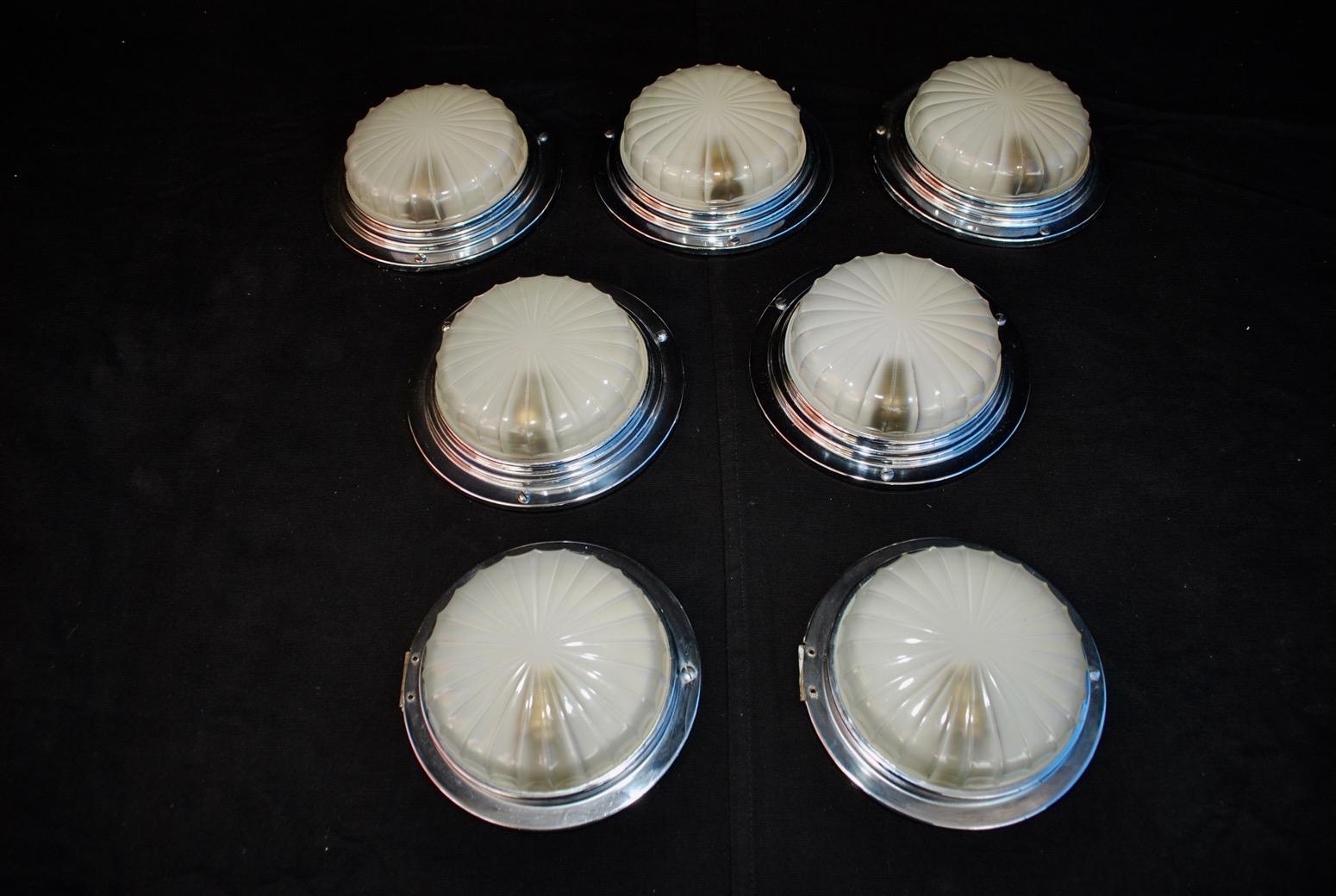 A sexy and rare set of seven flush lights, they are five one size and two a tiny little smaller, once they will be install very difficult to see the difference.

 