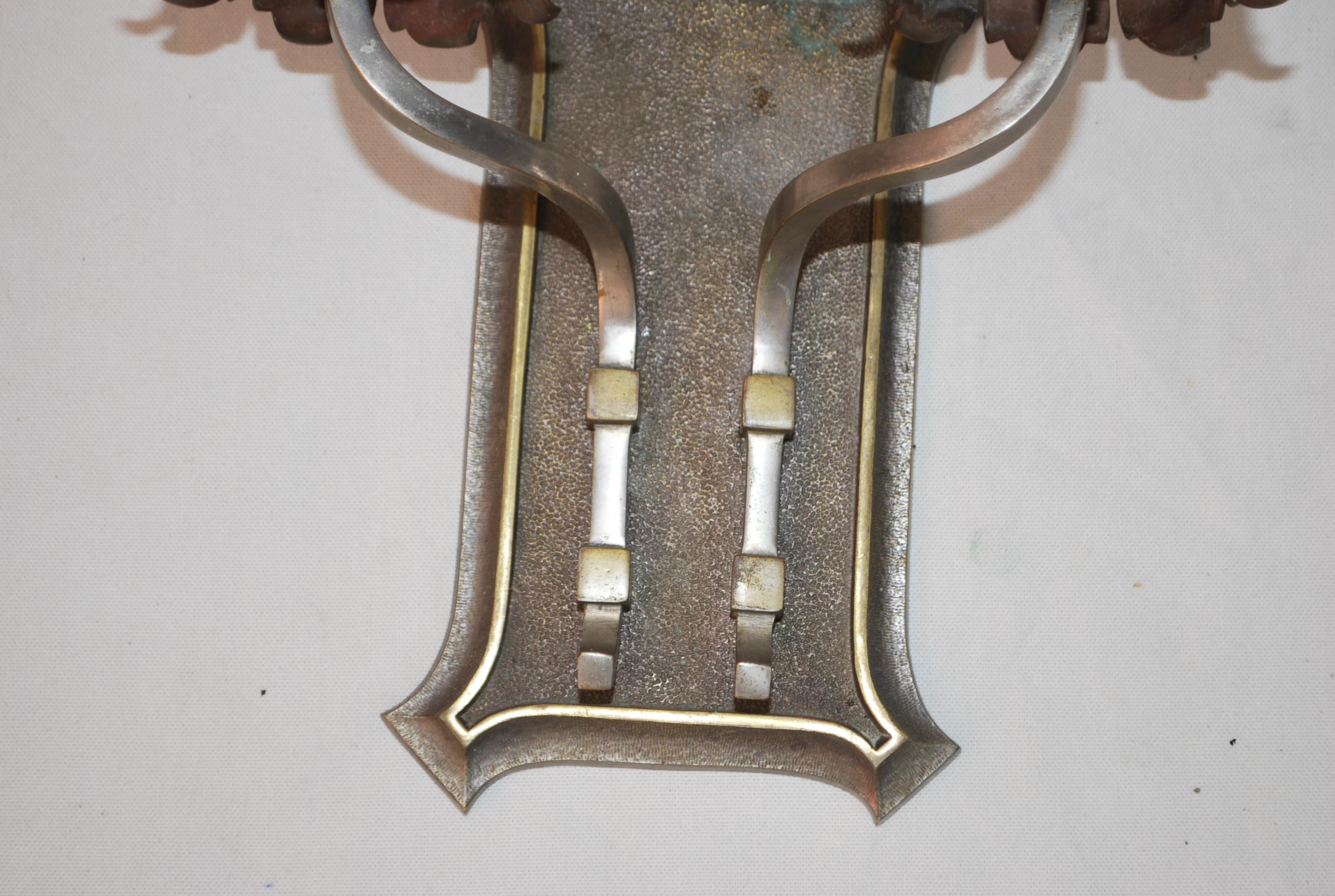 A beautiful and rare set of six solid brass or bronze sconces, they have a beautiful quality to it, they are heavy, the patina is so much nicer in person