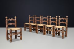 Raro juego de seis sillas de comedor brutalistas Charles Dudouyt de roble y cuerda, Francia, década de 1940