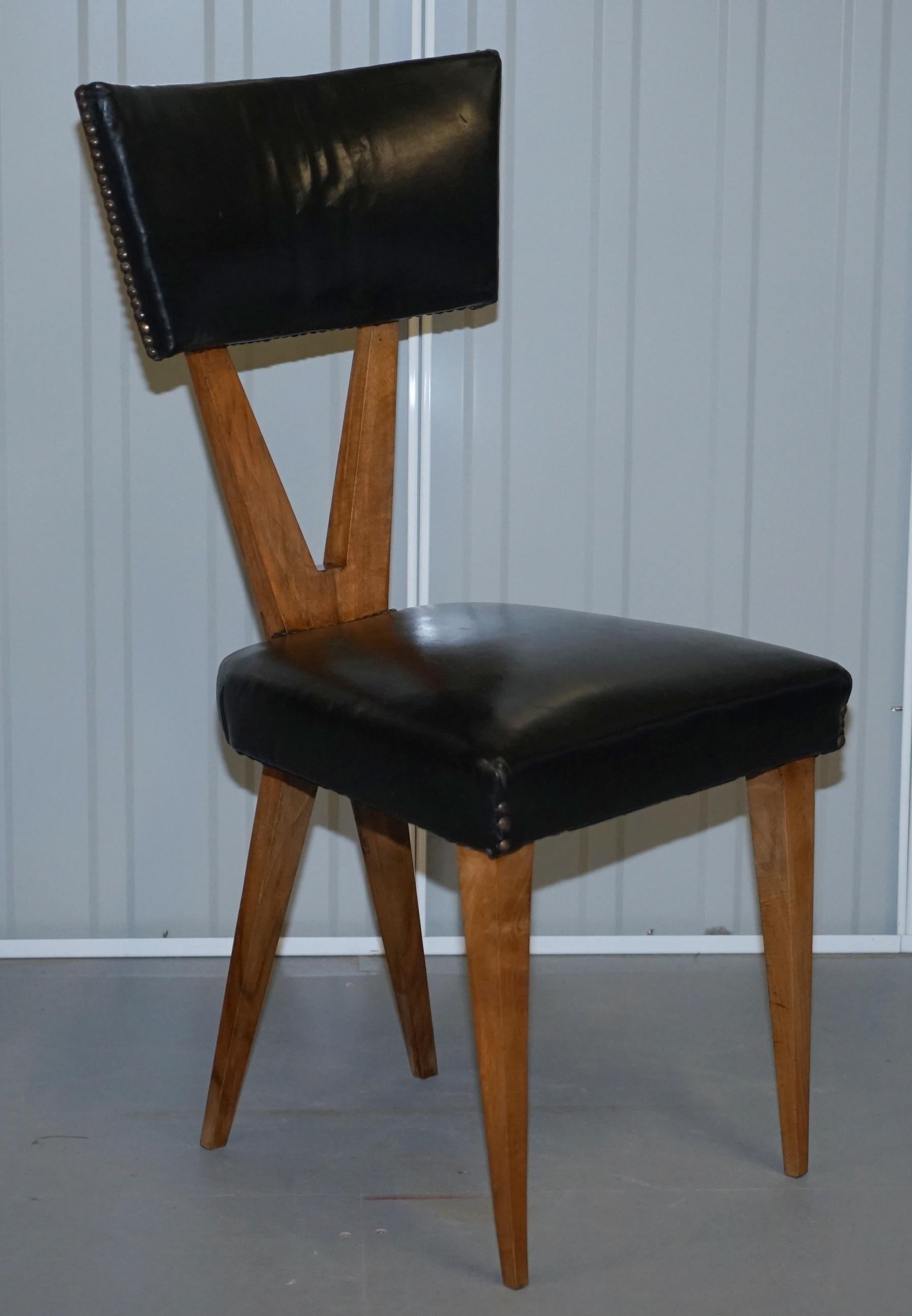 We are delighted to offer for sale this very rare set of circa 1950 Italian walnut and black leather Gianni Vigorelli X-framed dining chairs

An exceptionally stylish and Postmodern style set of six chairs by the wonder that was and always will be