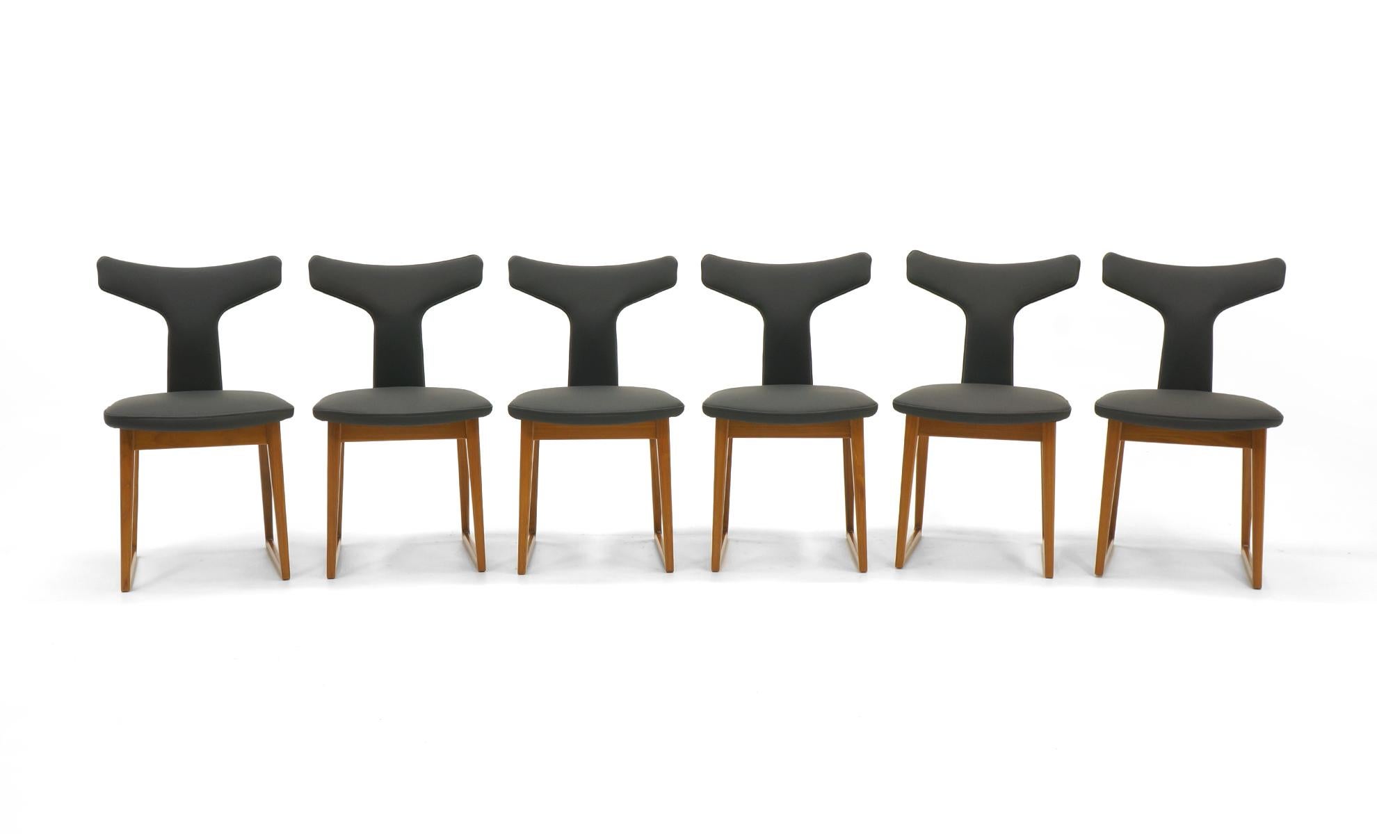 Very rare set of 6 dining chairs designed by Arne Vodder and made by Sibast, Denmark. Sibast was one of the finest makers of Danish modern design. We have fully restored this set including new black leather upholstery and expertly refinished teak