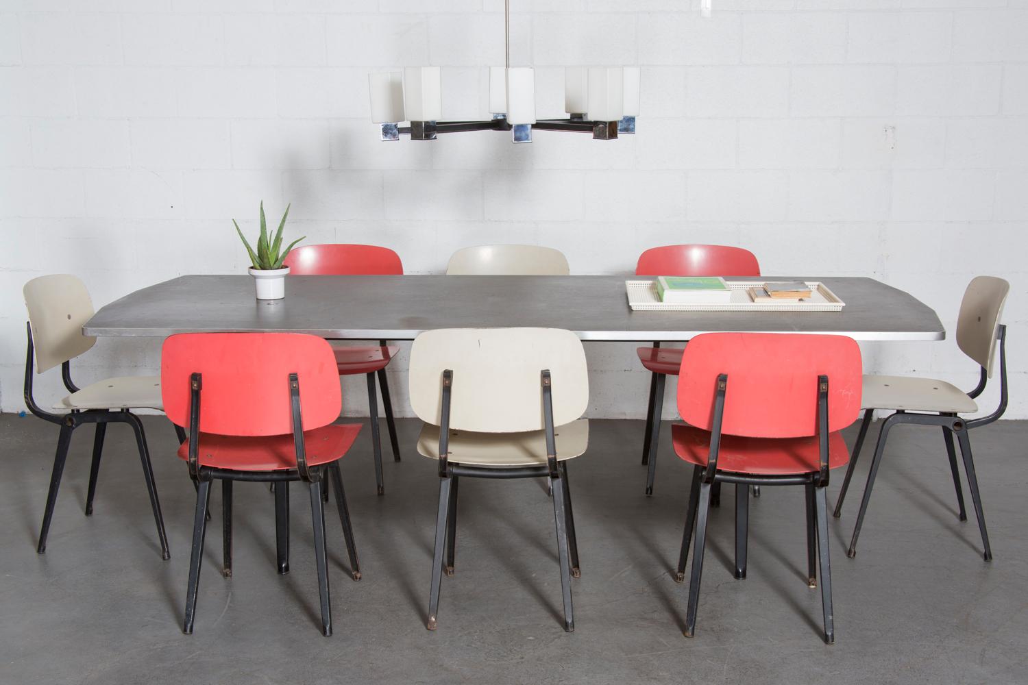 Originally designed in 1953 by Friso Kramer for Ahrend de Cirkel. The Revolt chair is widely considered by the Dutch to be the perfect chair. A system of folding sheet steel was developed for the construction of this chair which when combined with