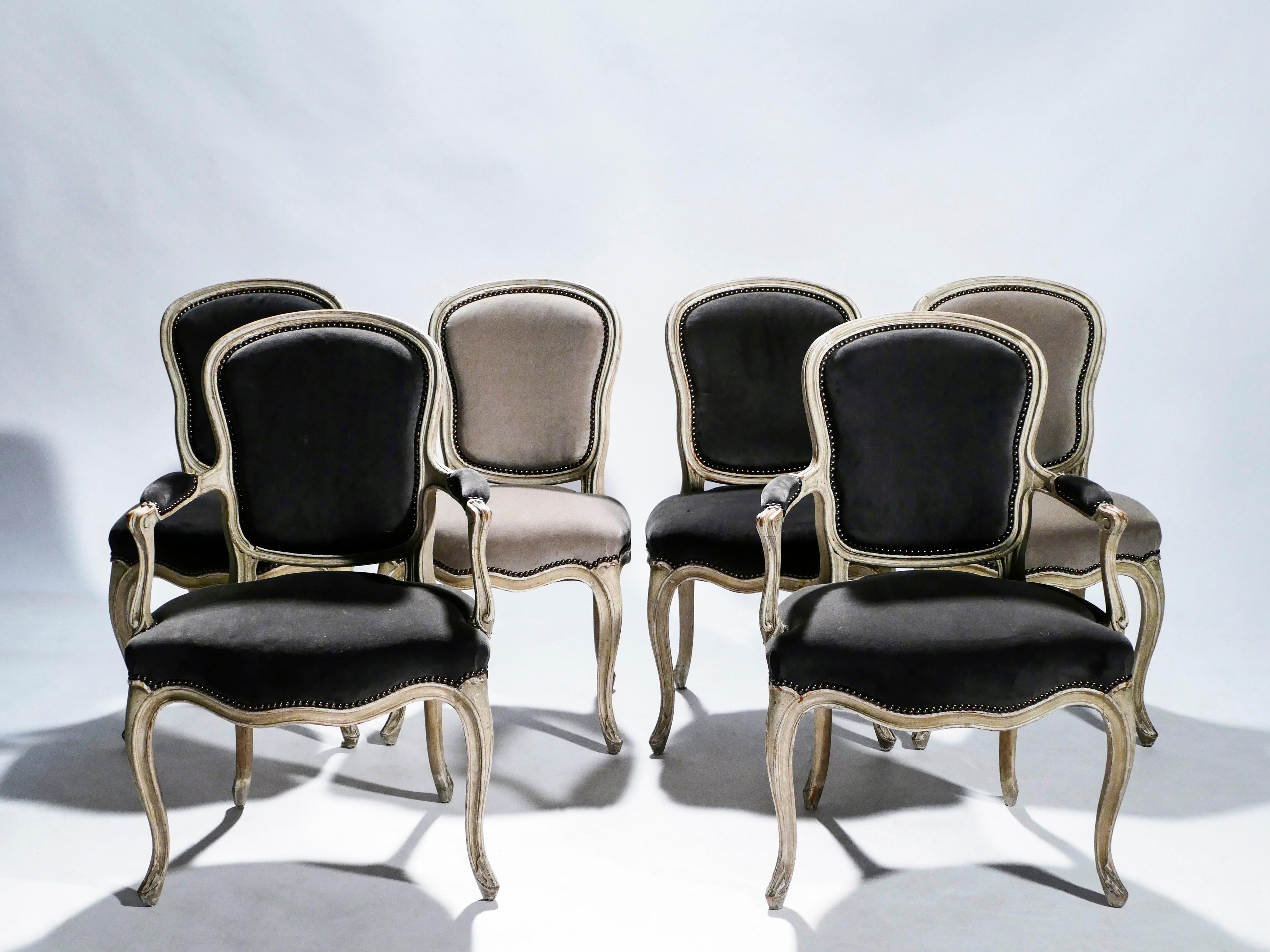 The construction of this set of 4 chairs and 2 armchairs was deeply cared about, and it shows in the finished product, even some eight decades later. The chairs were made and stamped by French firm Maison Jansen in the early 1940s in their pure