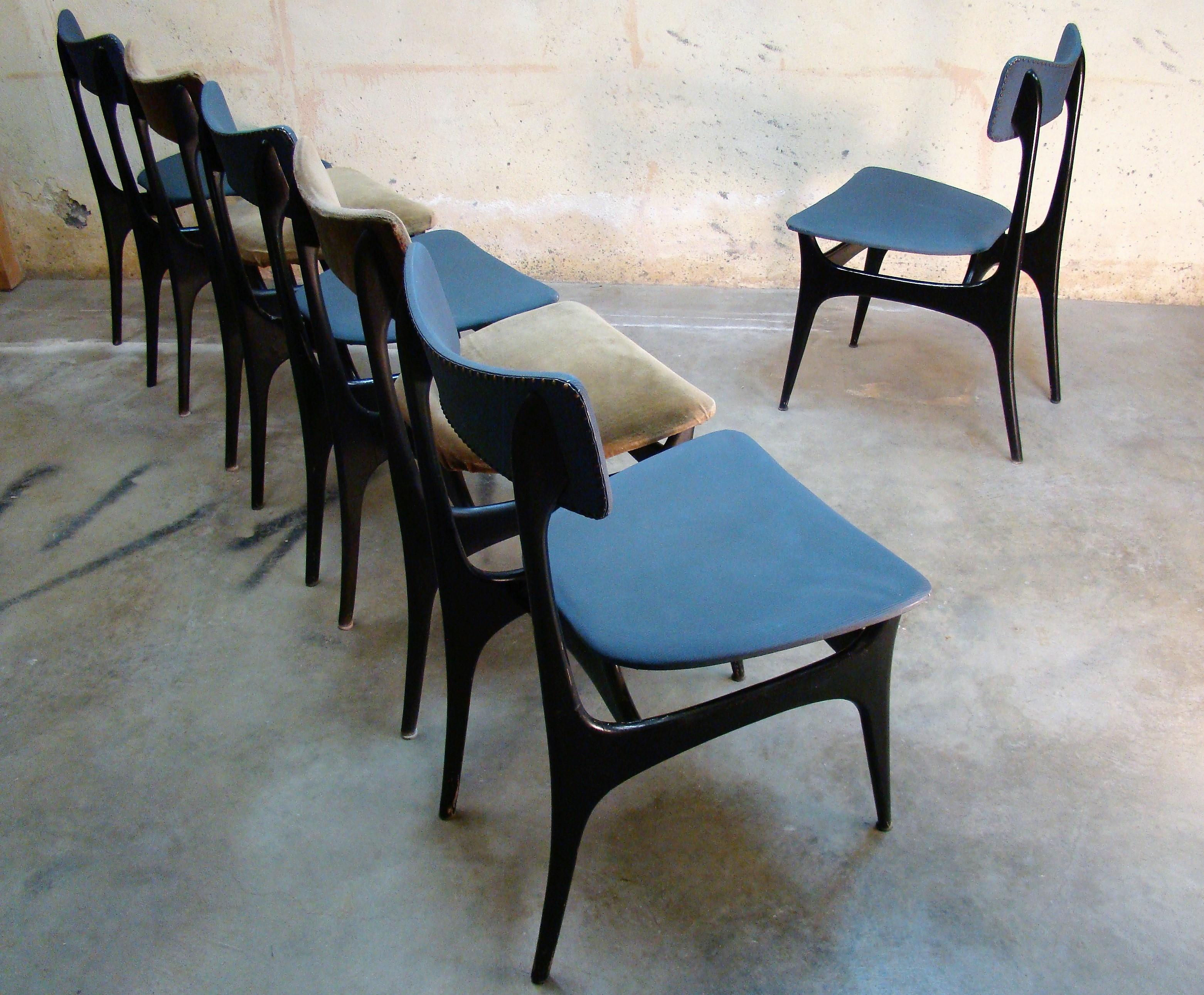 Rare set of six 1950s black lacquered, teak dining chairs designed by Alfred Hendrix for the Belgian firm Belform. Very uncommon chairs, even in the European market. Sculptural with high floating seat rests and an unusually tall span supporting the