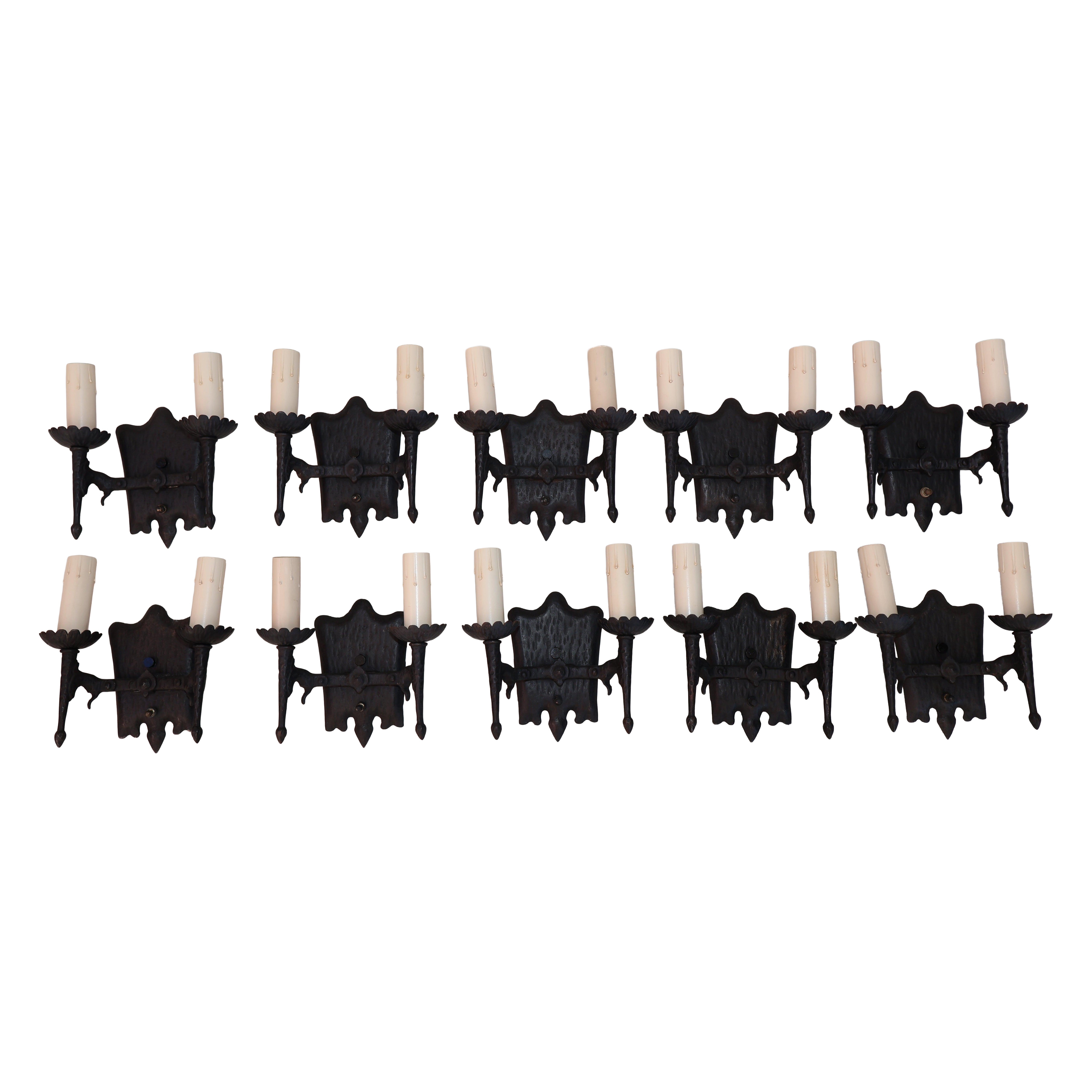Rare set of ten 1920's cast iron sconces ( PRICE IS FOR ONE PAIR )