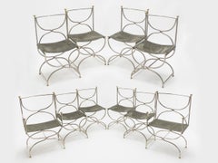 Rare ensemble de dix chaises mi-siècle en acier, laiton et cuir Maison Jansen, années 1960