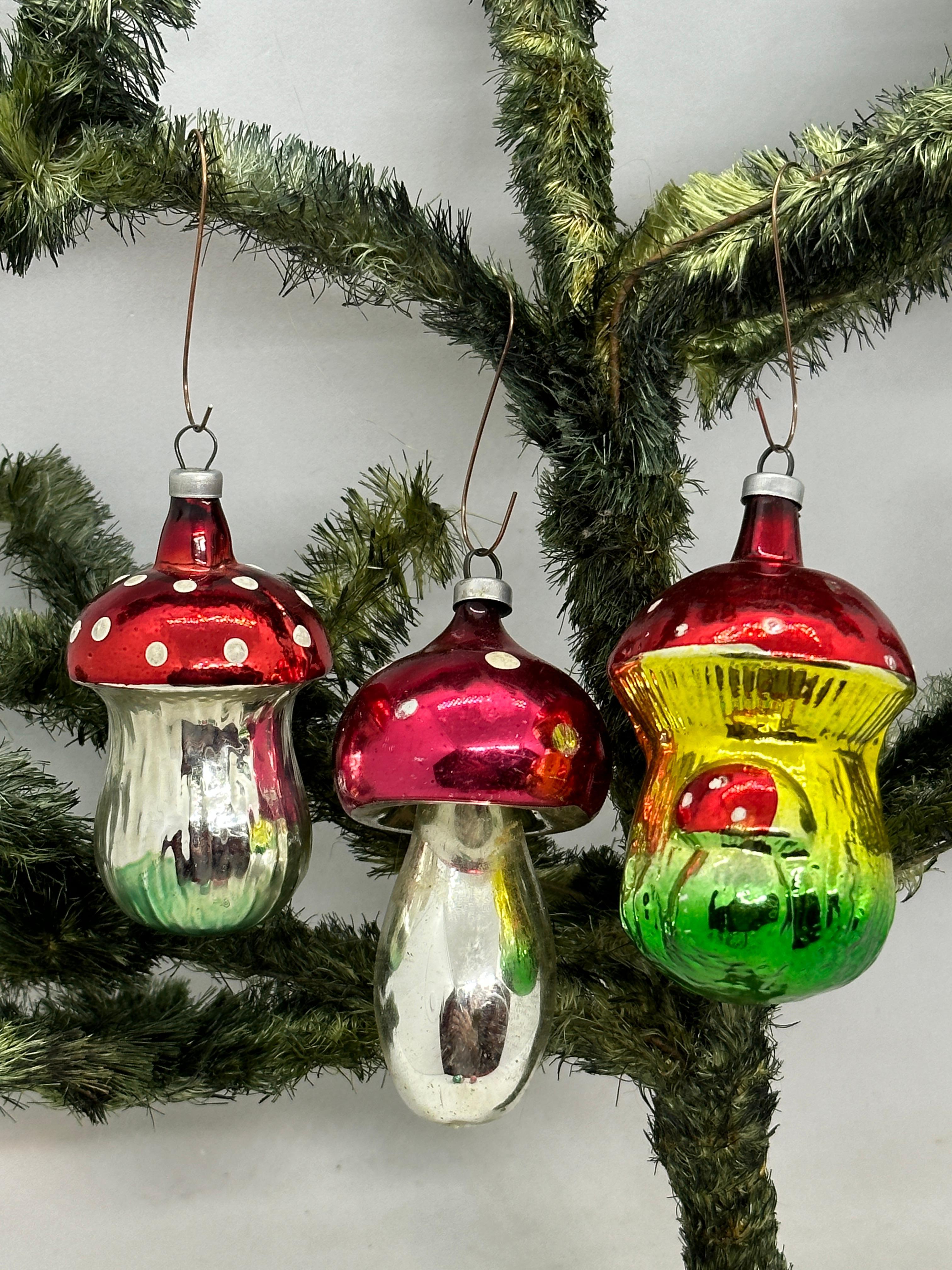 A rare Christmas ornament set of three. Each is made from mouth blown glass, this would be a great addition for your Christmas or feather tree. Size always given for the tallest item in the pictures. Age approx. 1930s to 1950s, sometimes older.
  