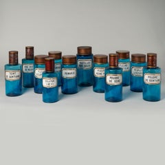 Rare Set of Twelve 19th Century French Blue Glass Apothecary Jars & Bottles