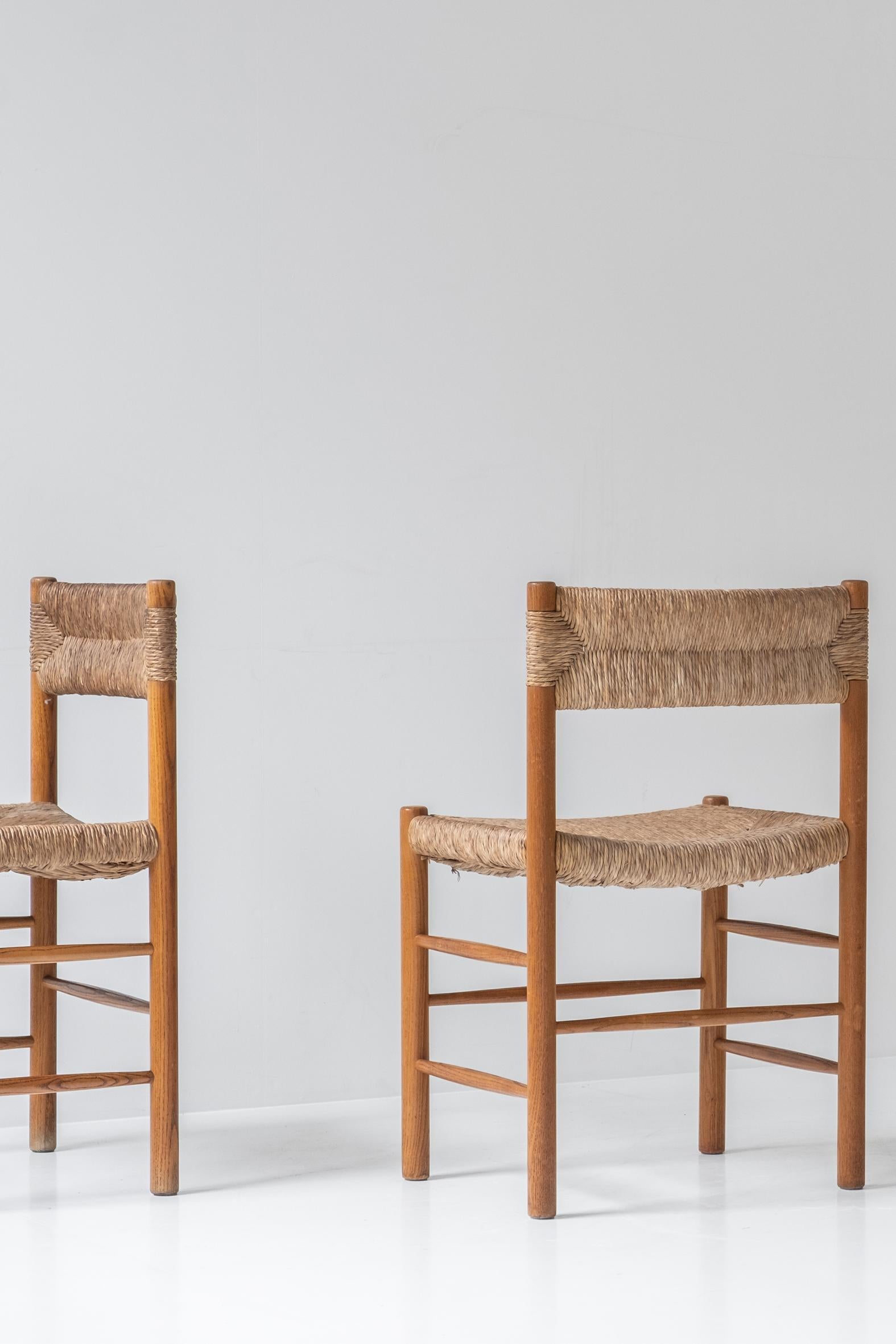 Rare set of twelve ‘Dordogne’ chairs by Charlotte Perriand for Sentou, 1960s 10