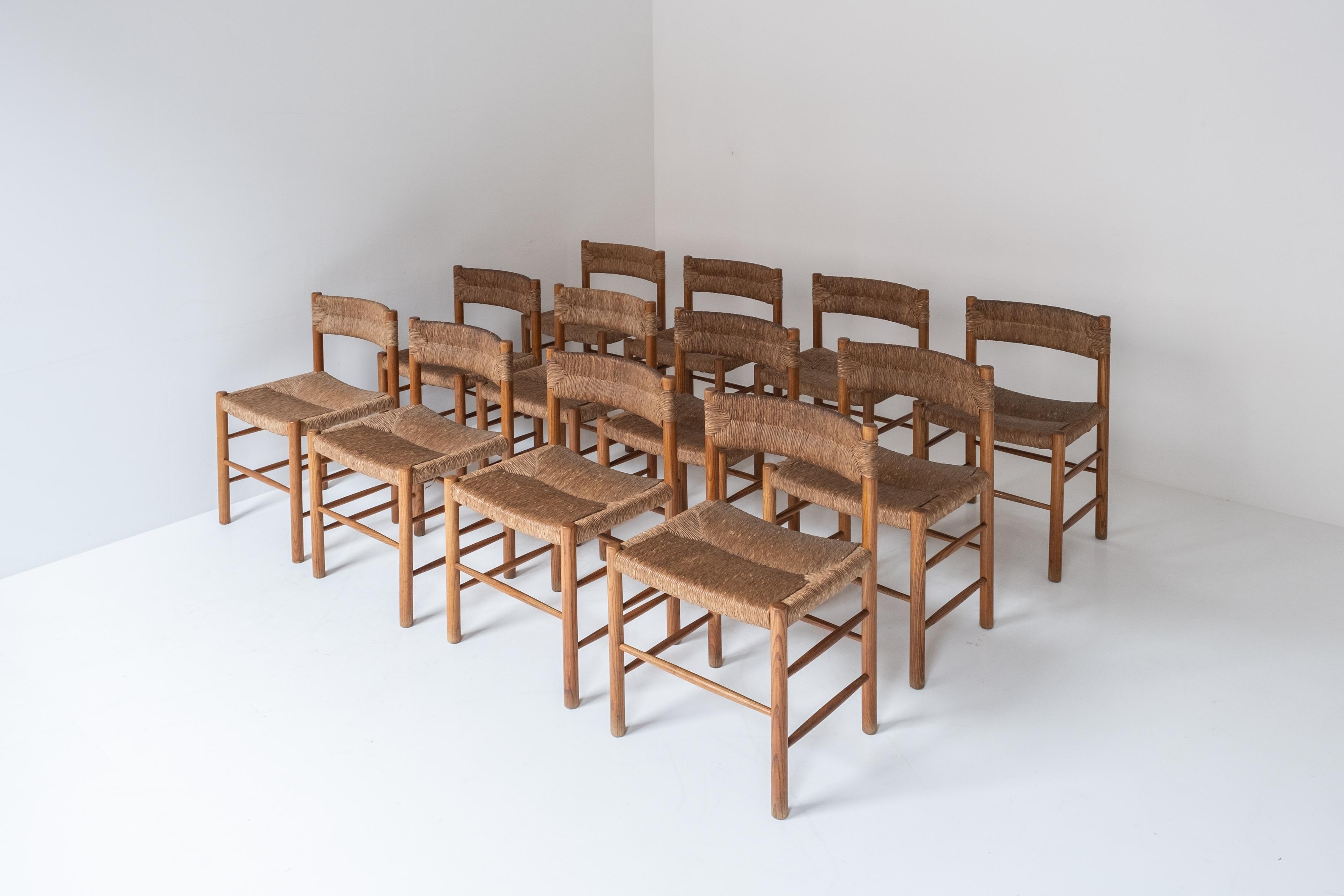 Rare set of twelve ‘Dordogne’ chairs by Charlotte Perriand for Sentou, 1960s In Good Condition In Antwerp, BE