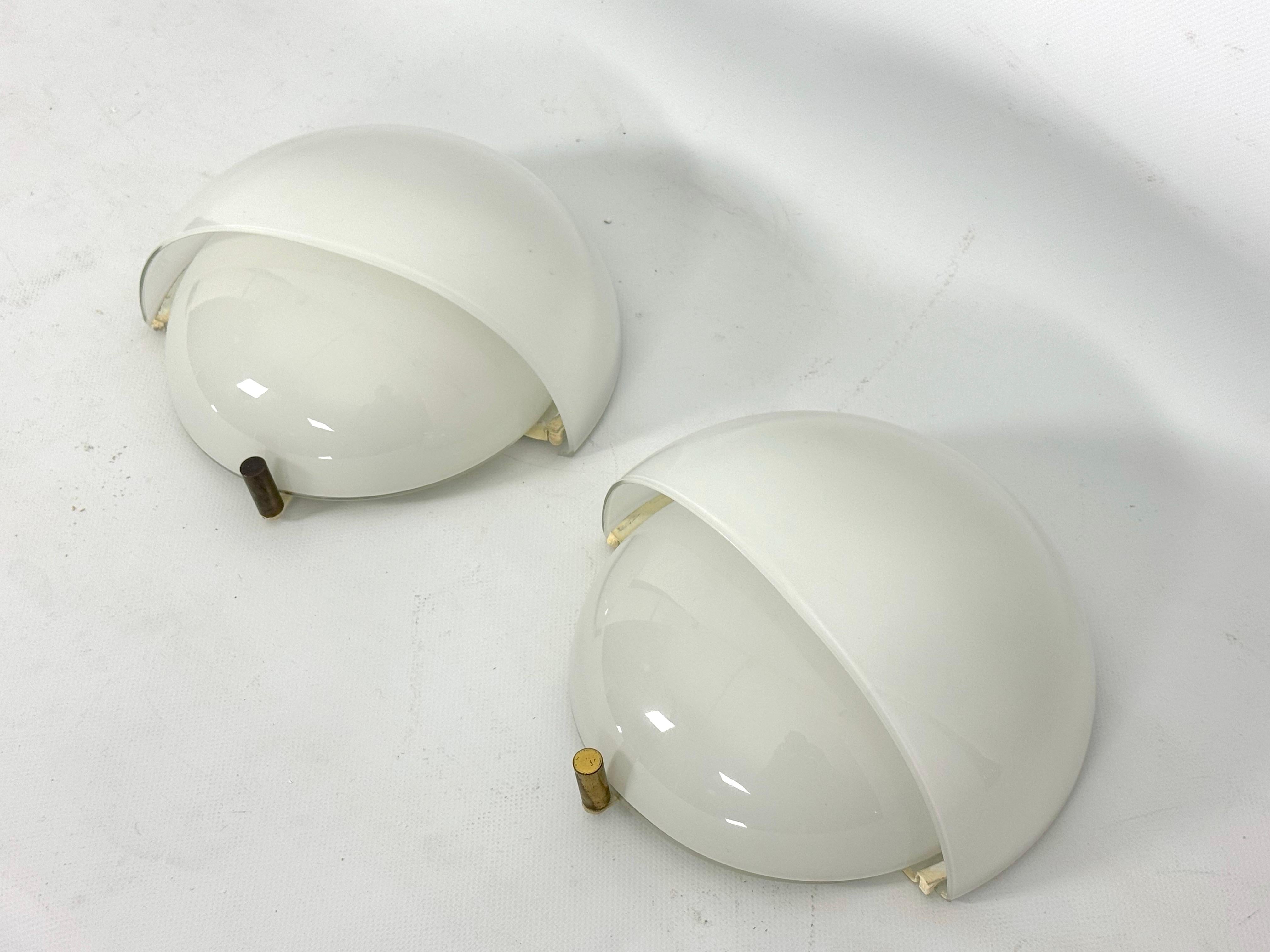 Mid-Century Modern Rare Set of two Glass and brass Mania sconces by Vico Magistretti for Artemide.  For Sale