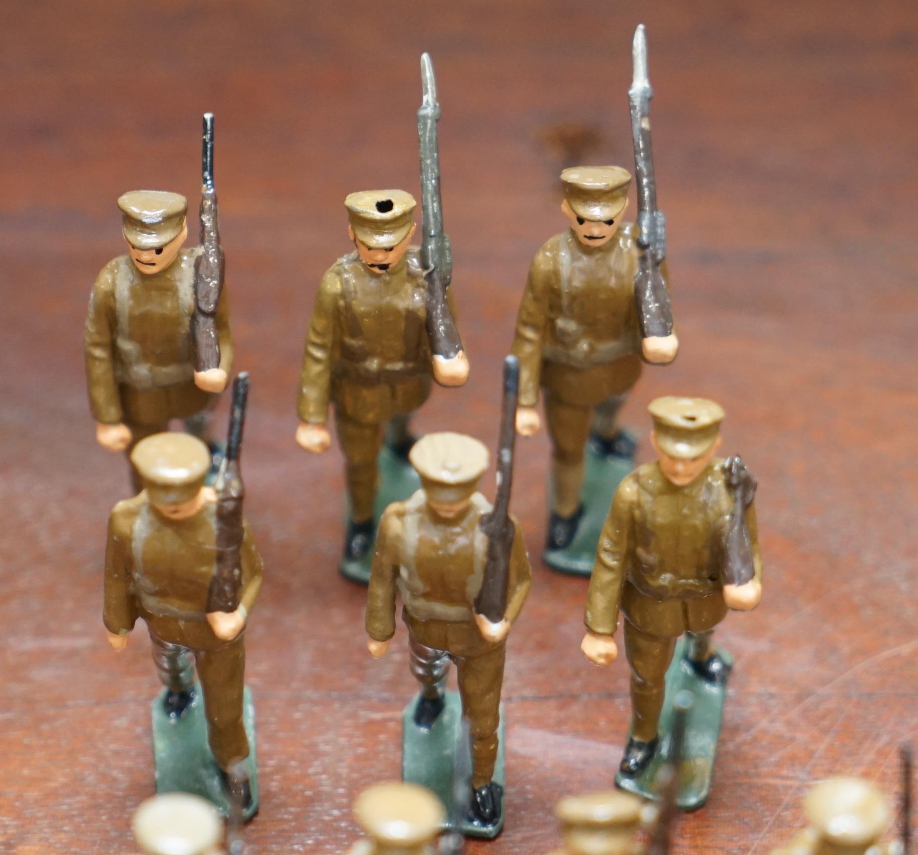 We are delighted to offer for sale this lovely set of antique world war I toy soldiers 52 pieces in total

A good looking and well made set in lovely vintage played with condition throughout

I have another set of 87 pieces and then a few royal