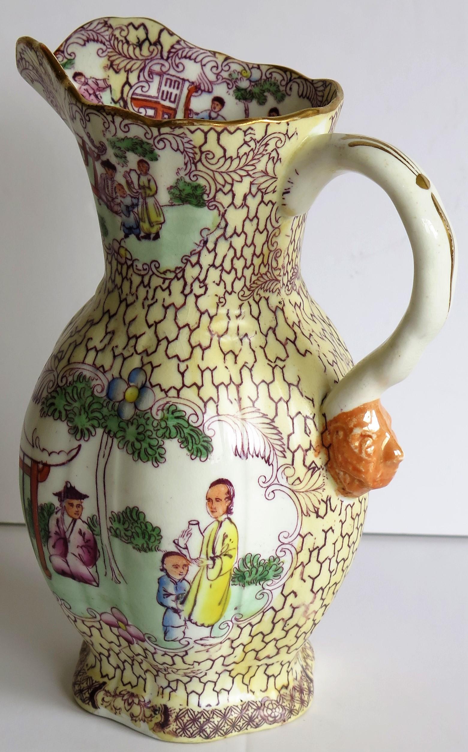 This is a superb Ironstone Jug or Pitcher made by the English Mason's Ironstone factory, dating to the late Georgian period, circa 1825.

The jug shape and pattern colorway are both rare.

The body is hexagonal in form, having a waisted central