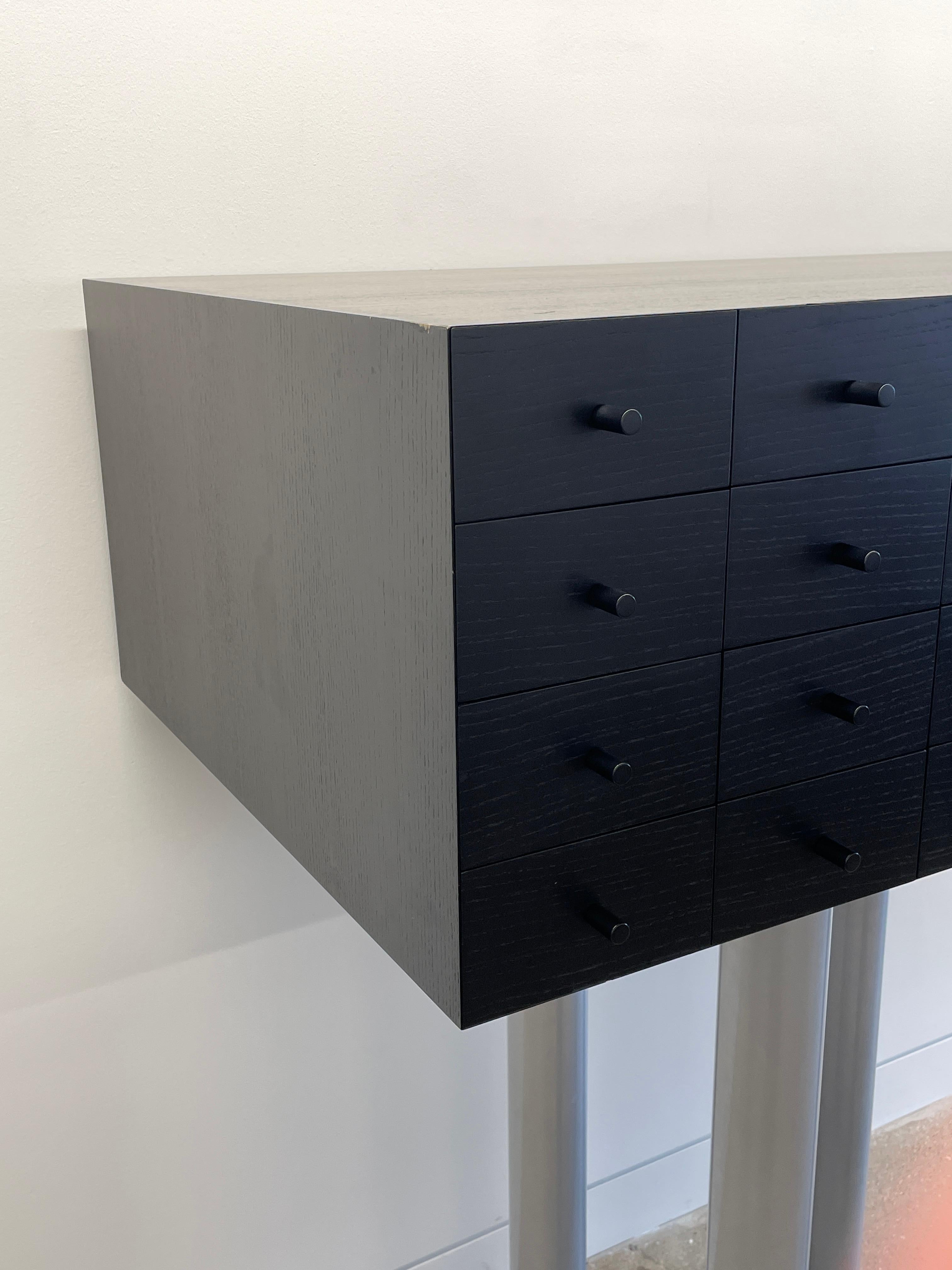 The Solaris is a commanding and haunting cabinet that stands assertively on four long legs. Solaris is part of the famous modern cabinet series: Prog­etti Compiuti designed in 1977. It was born from mystery and imagination and is a nod to the 1972