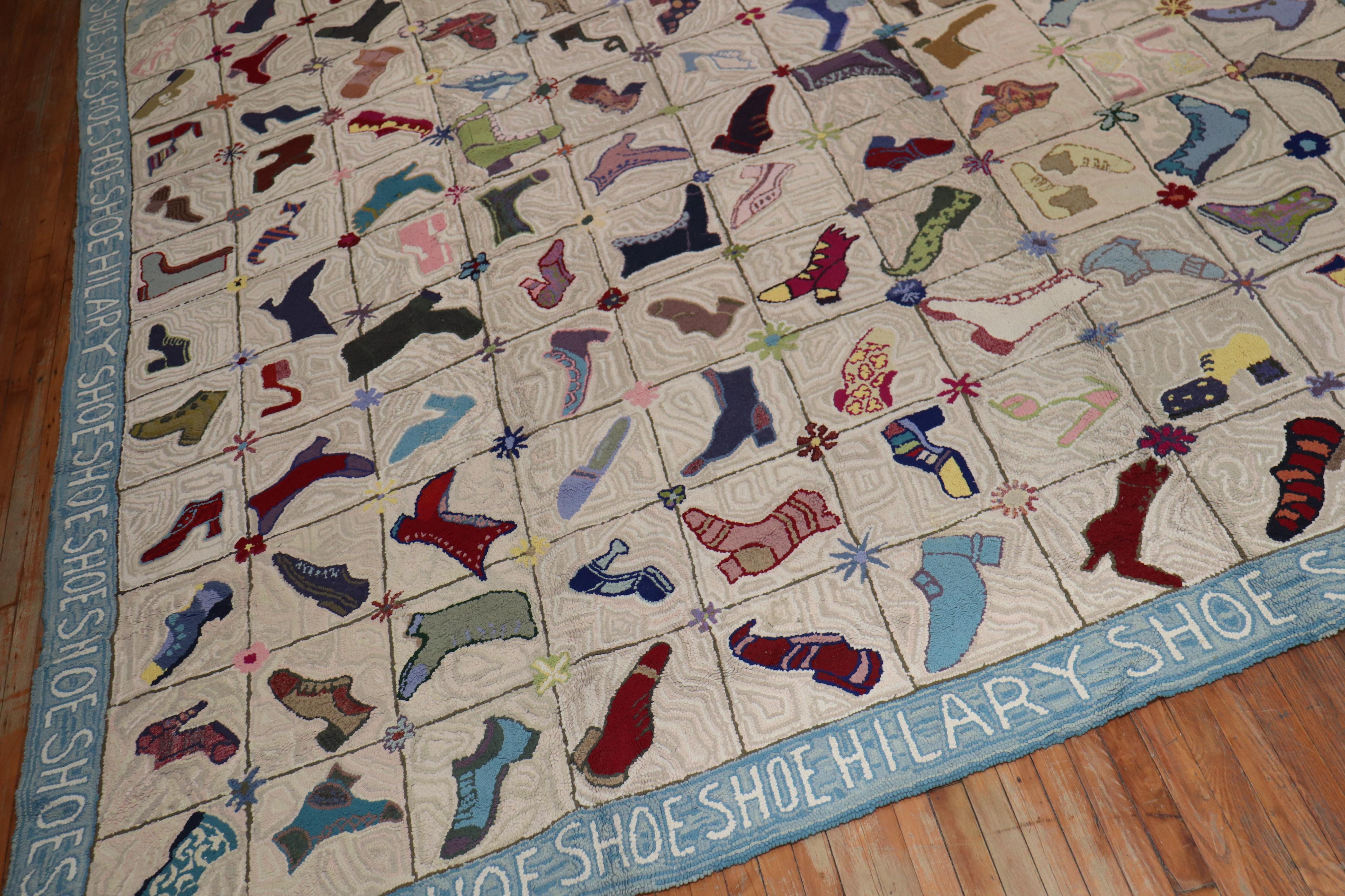 This rare American hooked rug has 130 different shoes with no similar pairs to be found. The light blue border has the word shoes all around with the name Hilary on both end which presumably might be the name of the person who custom ordered the