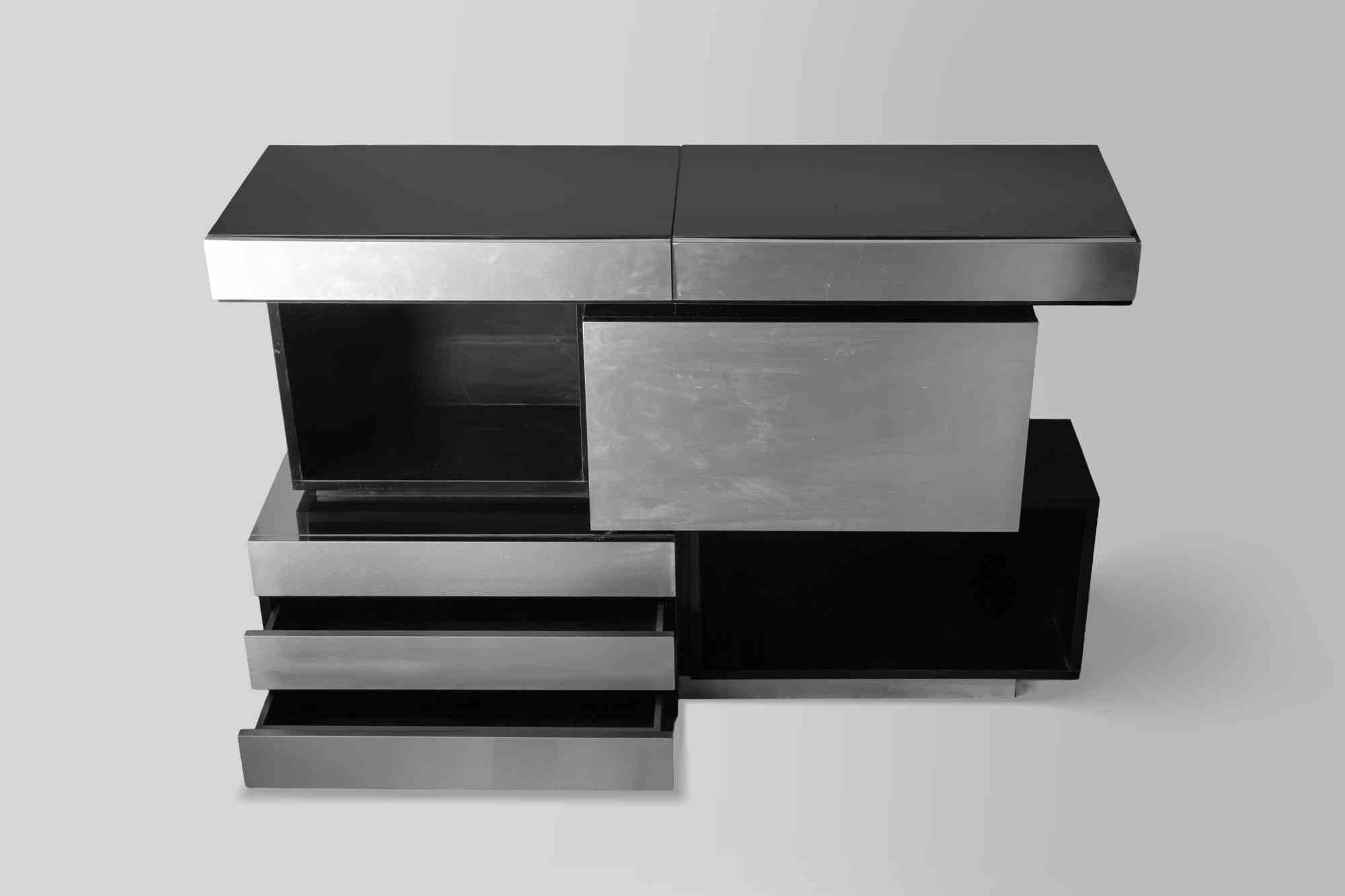 Rare vintage Sideboard by Giotto Stoppino for Acerbis, realized in 1970s.

Wood an chromed metal.