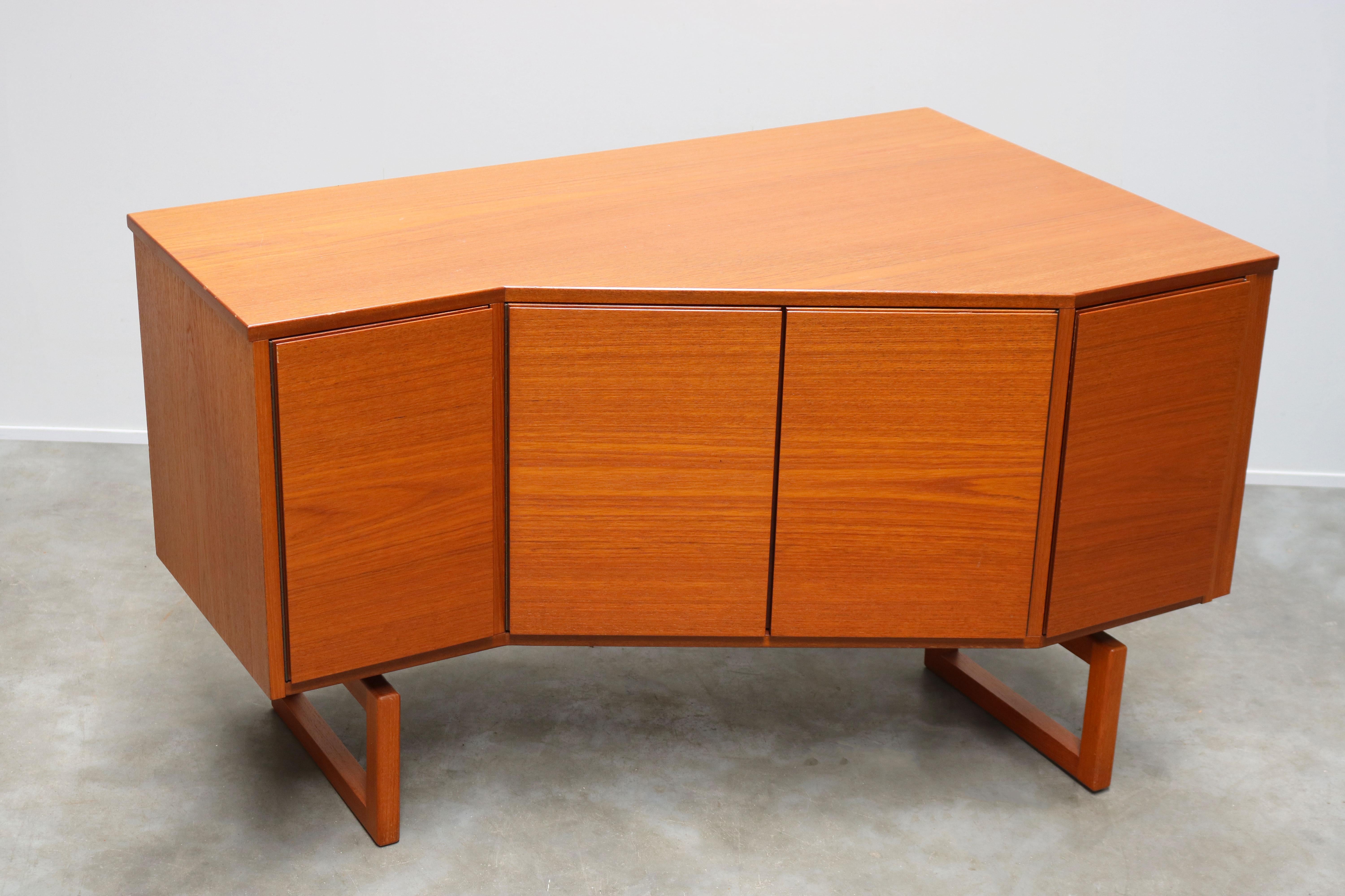 Very rare sideboard / corner cabinet by Arne Hovmand Olsen for Mogens Kold in the 1950s. This sideboard / cabinet is designed to be placed in a corner for your television / music system. Its very rare and we have never seen one like this before. The