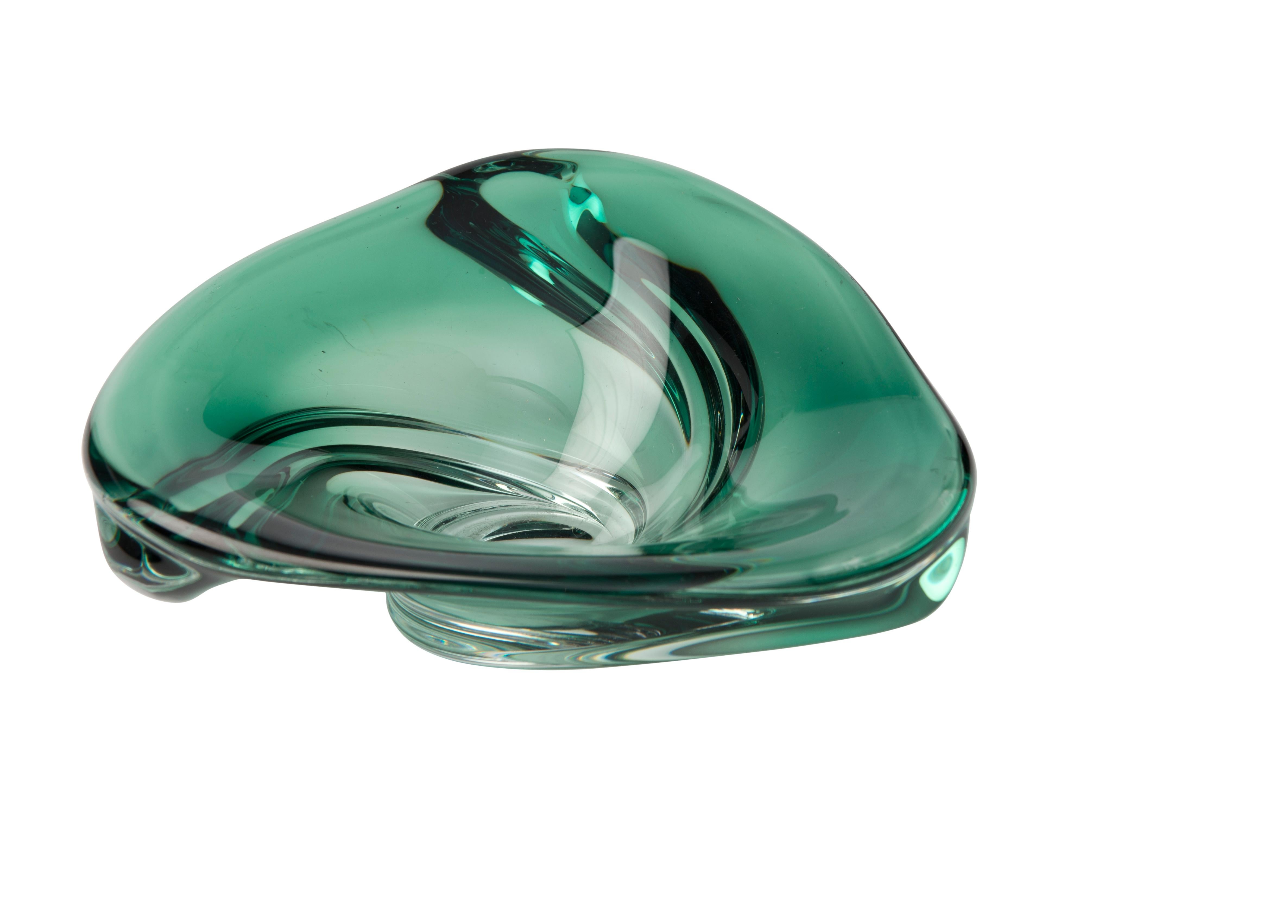 Rare model of a 1950s green crystal ashtray signed by Val Saint Lambert. This art glass ashtray depicts green water with crystal reflections with etched signature on bottom.