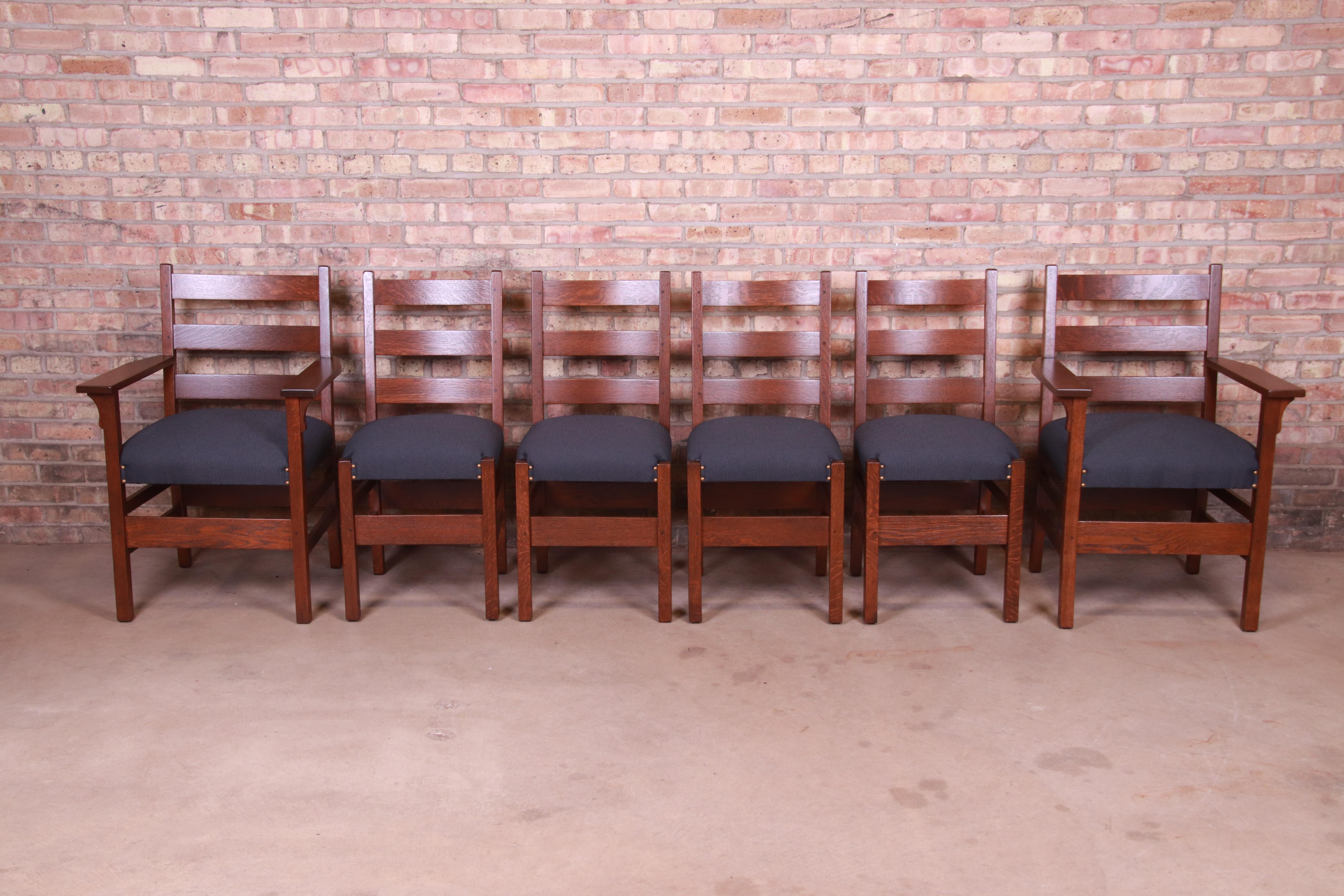 A rare and exceptional set of six mission Arts & Crafts ladder back dining chairs

By Gustav Stickley (signed with original branded label)

Eastwood, NY, circa 1900

Solid quarter sawn oak frames, with brass-studded upholstered