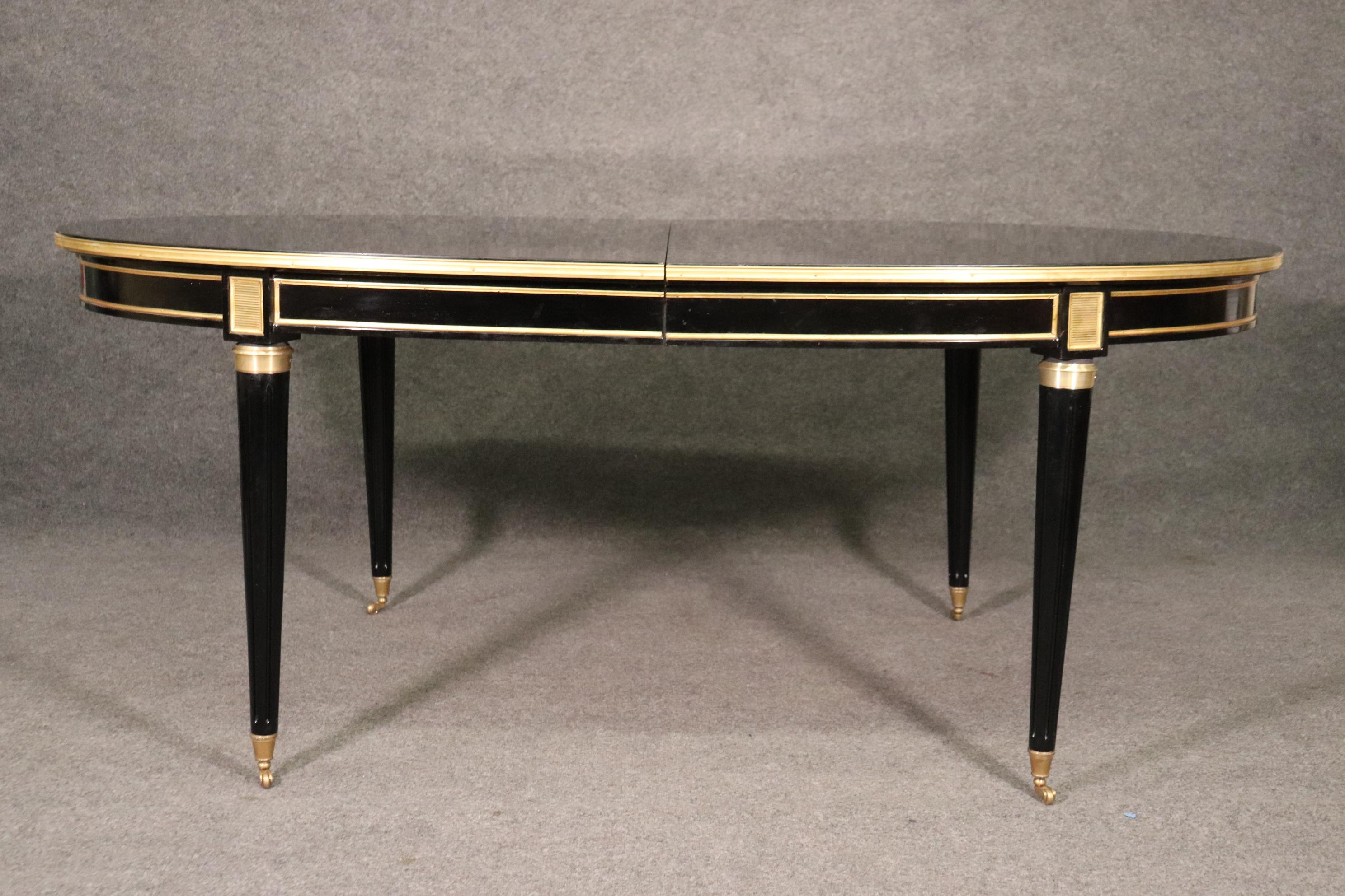 Mid-20th Century Rare Signed Maison Jansen Ebonized Bronze Mounted Oval Dining Table w 3 Leaves 