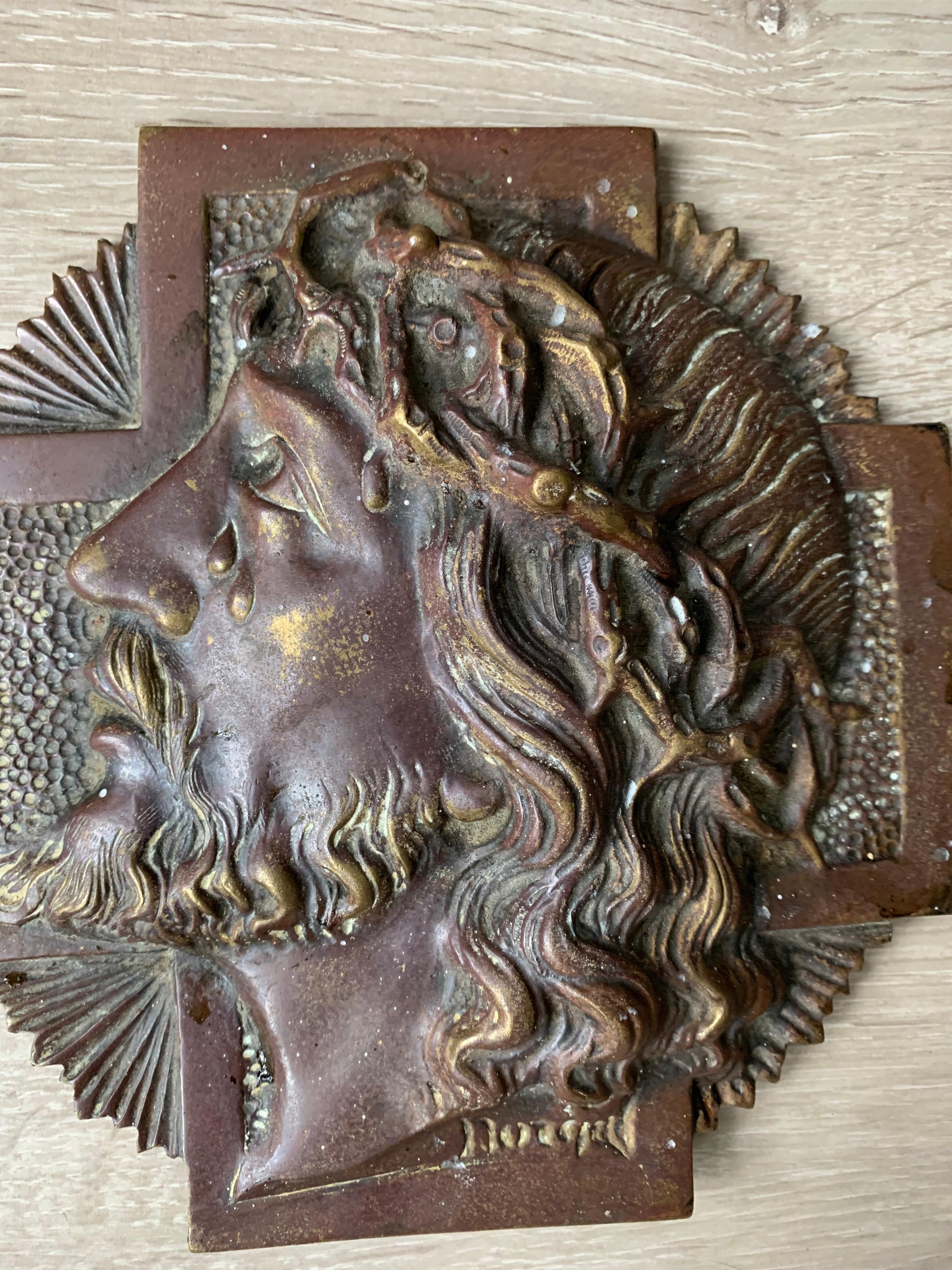 Small but impressive work of religious art.

Having sold many works of religious art we immediately noticed the tears that are on this Christ wall plaque. This 1920s Art Deco plaque by renowned artist Sylvain Norga of Belgium is one of only a very