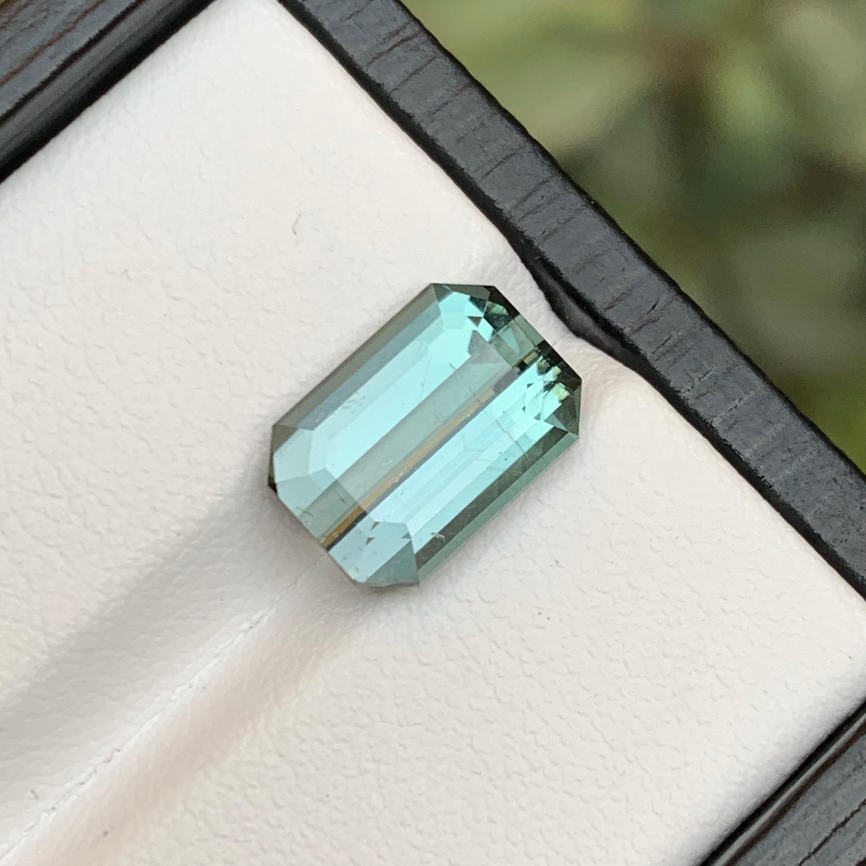 A very impressive Silver Grey Emerald Cut Natural Tourmaline Loose Gemstones from Afghanistan! This exquisite Emerald Cut gemstone is a radiant celebration of elegance and sophistication. Mined in the heart of Afghanistan, its mesmerizing Silver