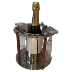 Rare seau à champagne en métal argenté et cuir avec porte-flûtes, français, Circ.