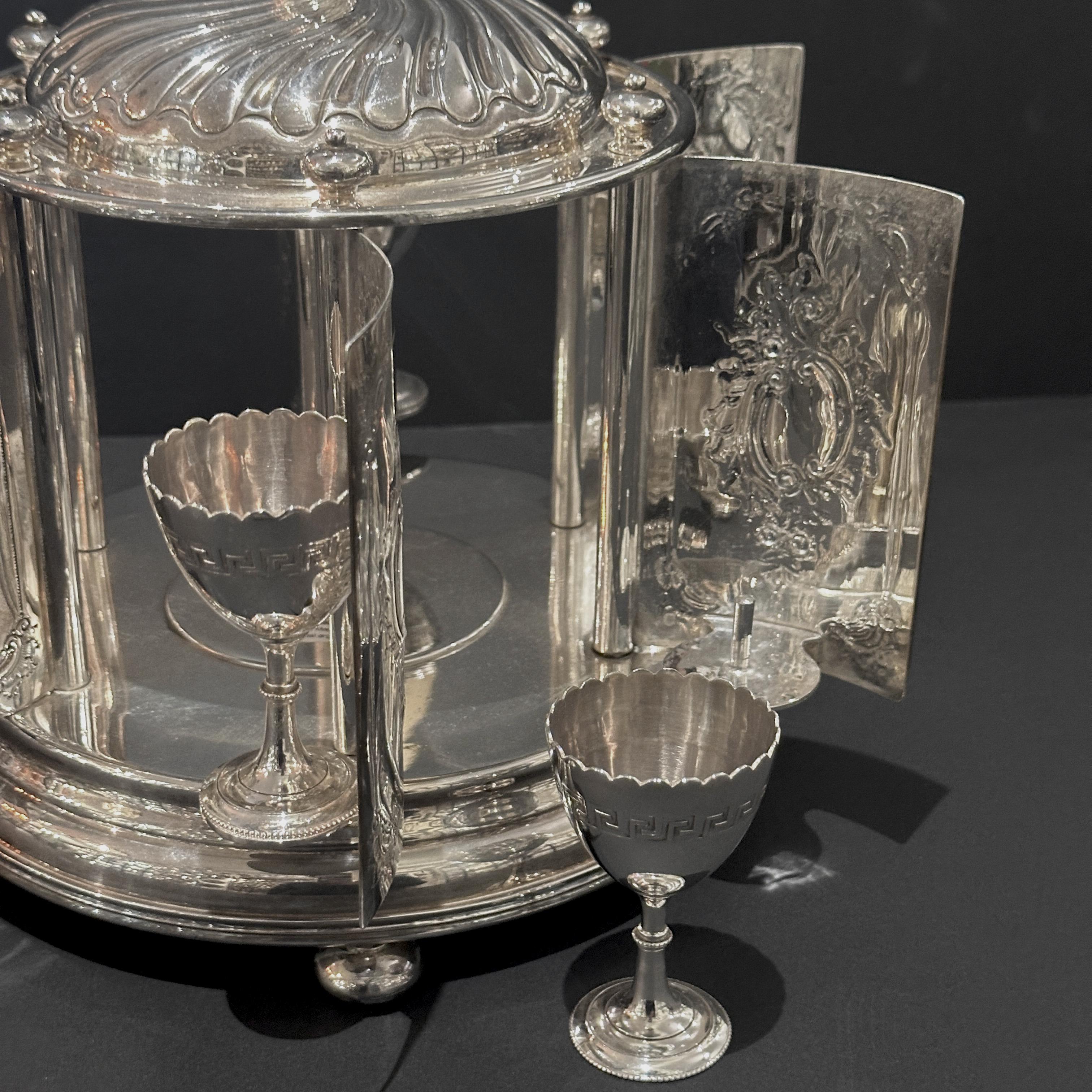 Rare silver plated egg carrousel, Mappin and Webb, London 1