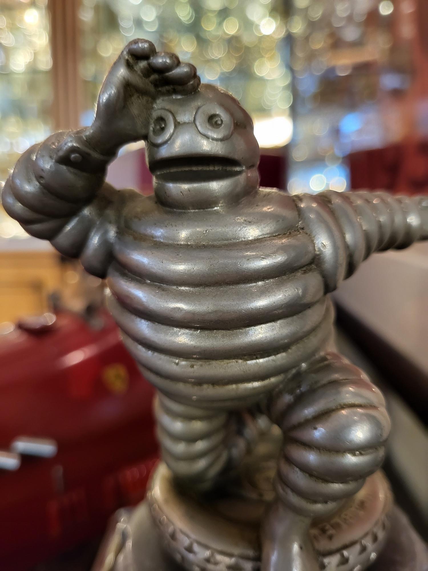 Michelin

The earliest design of the famous tyre manufacturer’s car mascot, dating from 1916, featuring Mr. Bibendum (Michelin Man) in the ‘scruter l’horizon’ stance (looking into the distance) and kneeling on a Michelin tyre. the heavy and solid