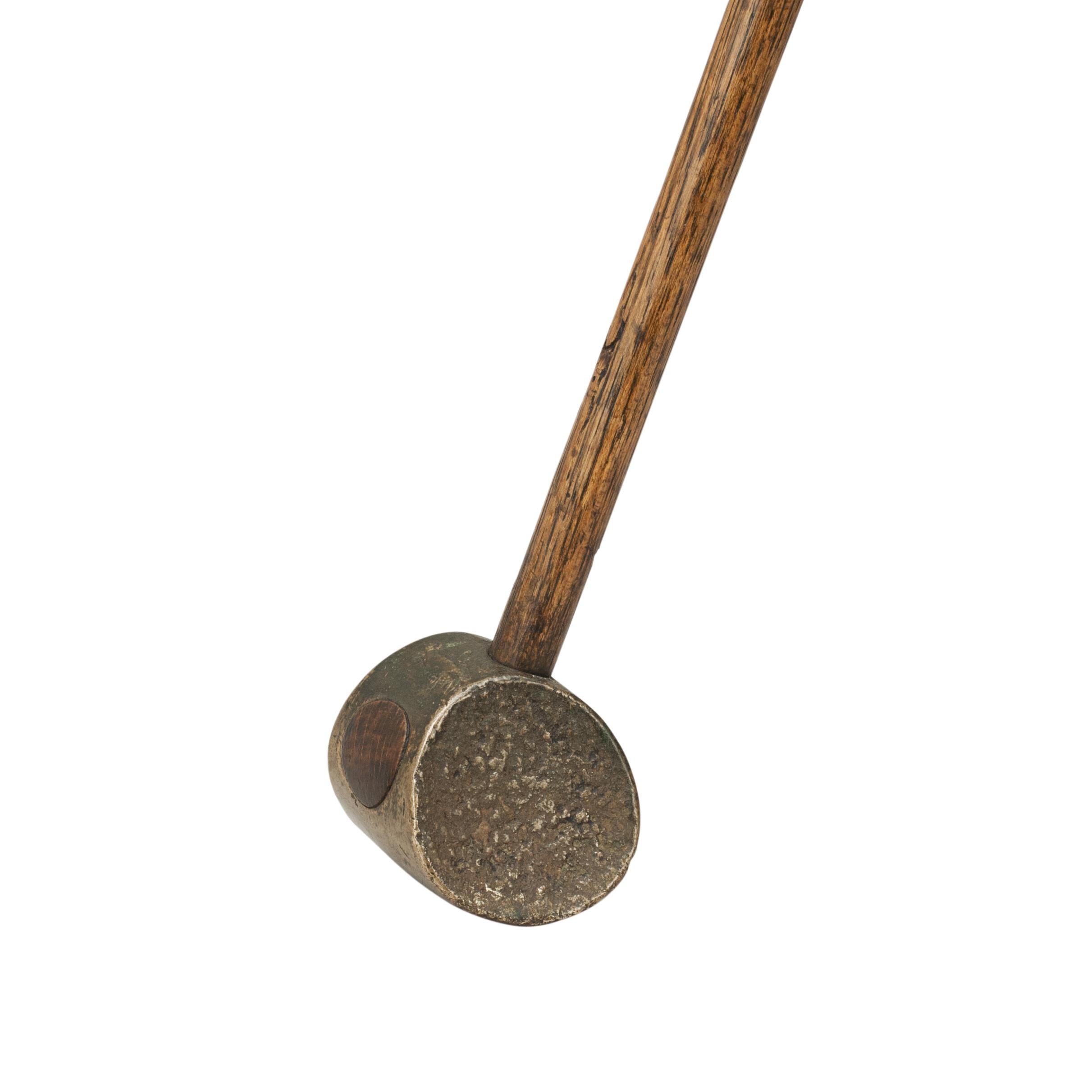 Mallet Head Golf Club by Sir Walter Dalrymple. Duplex 'Hammer ' golf club, Mashie and a Putter, by Sir Walter Dalrymple (the Baronet of North Berwick). The double faced hammer headed club stamped No.18 with the mashie face being dished and textured,