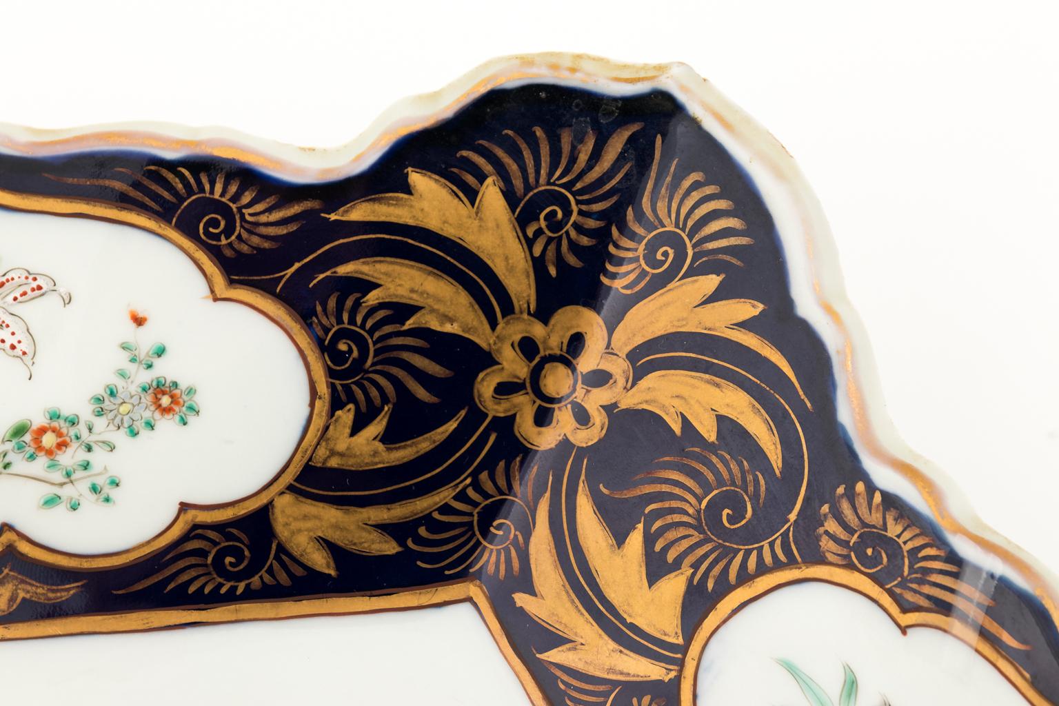Rare shaped oriental charger. Vibrant colors. Six-star corners with a medallion design. Hand-painted. Signed on back.
  