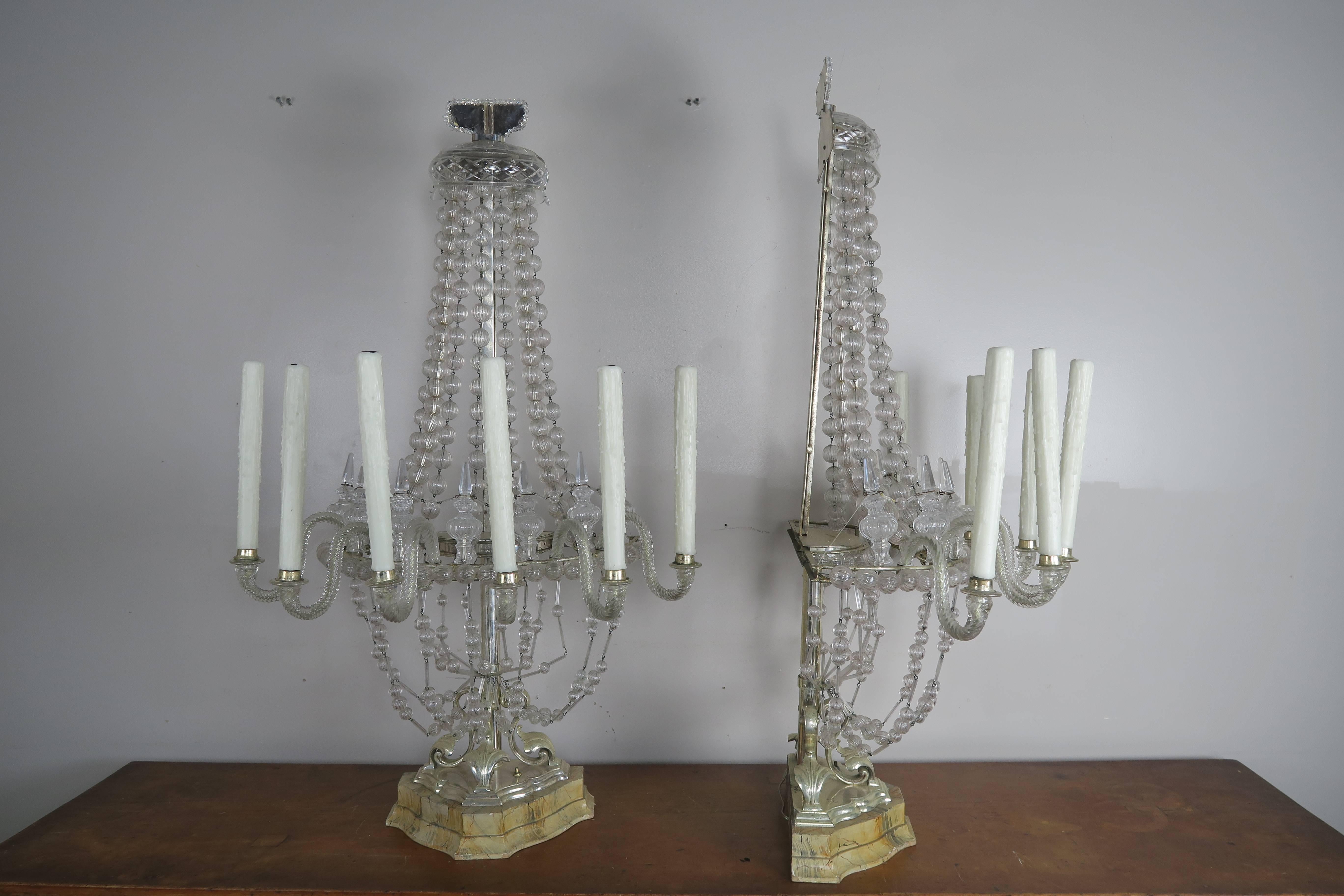 Pair of unique Venetian six-light monumental handblown Murano glass lamps made with garlands of handblown balls. The lamp sits on silver plated and faux painted marble bases. The lamps have been newly rewired with American sockets and are ready to