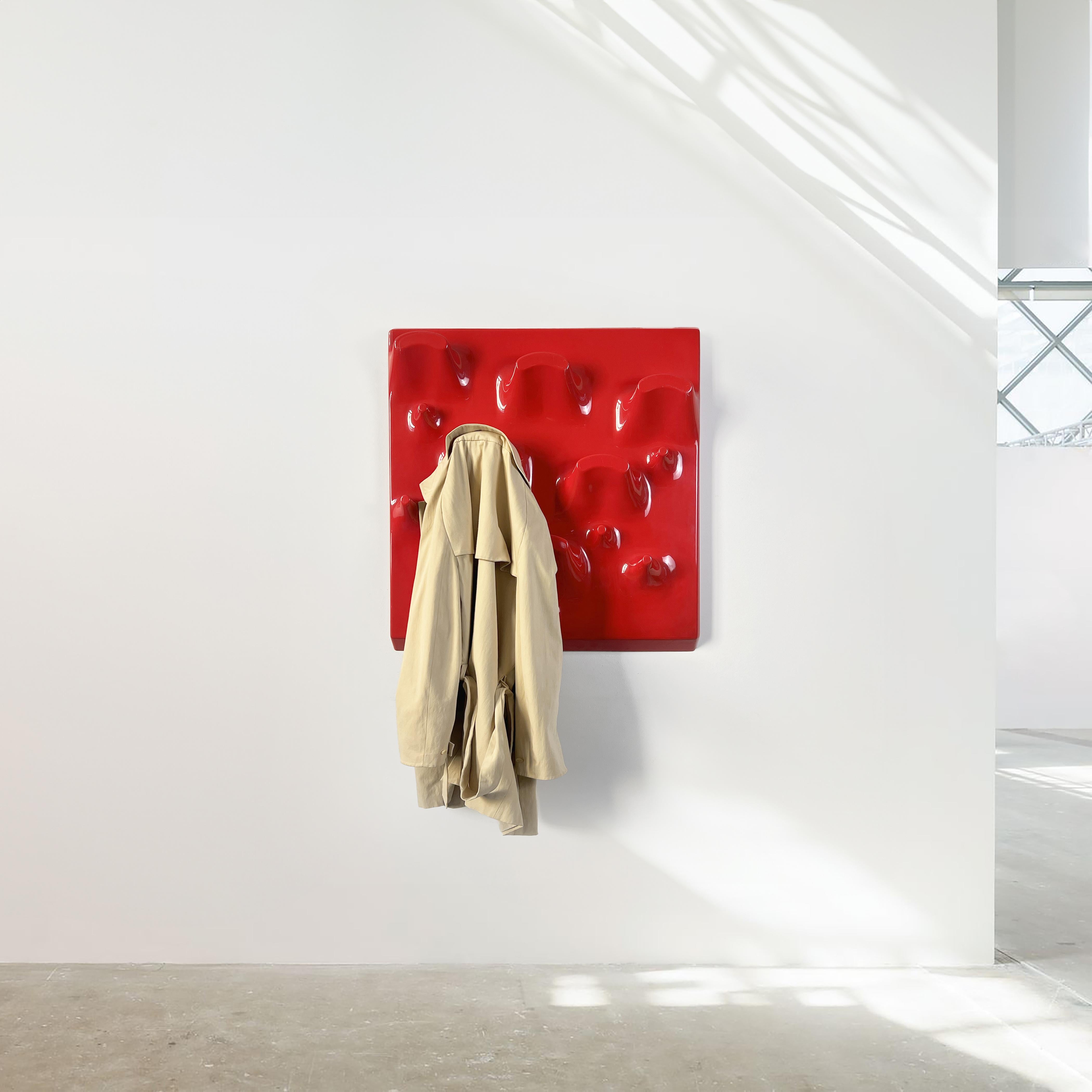 The Coat Rack Mod Slab, designed by Jonathan De Pas, Donato D’Urbino, and Paolo Lomazzi for Longato in Italy in 1969, stands as an iconic piece of mid-century modern design. This innovative and functional coat rack exemplifies the designers'