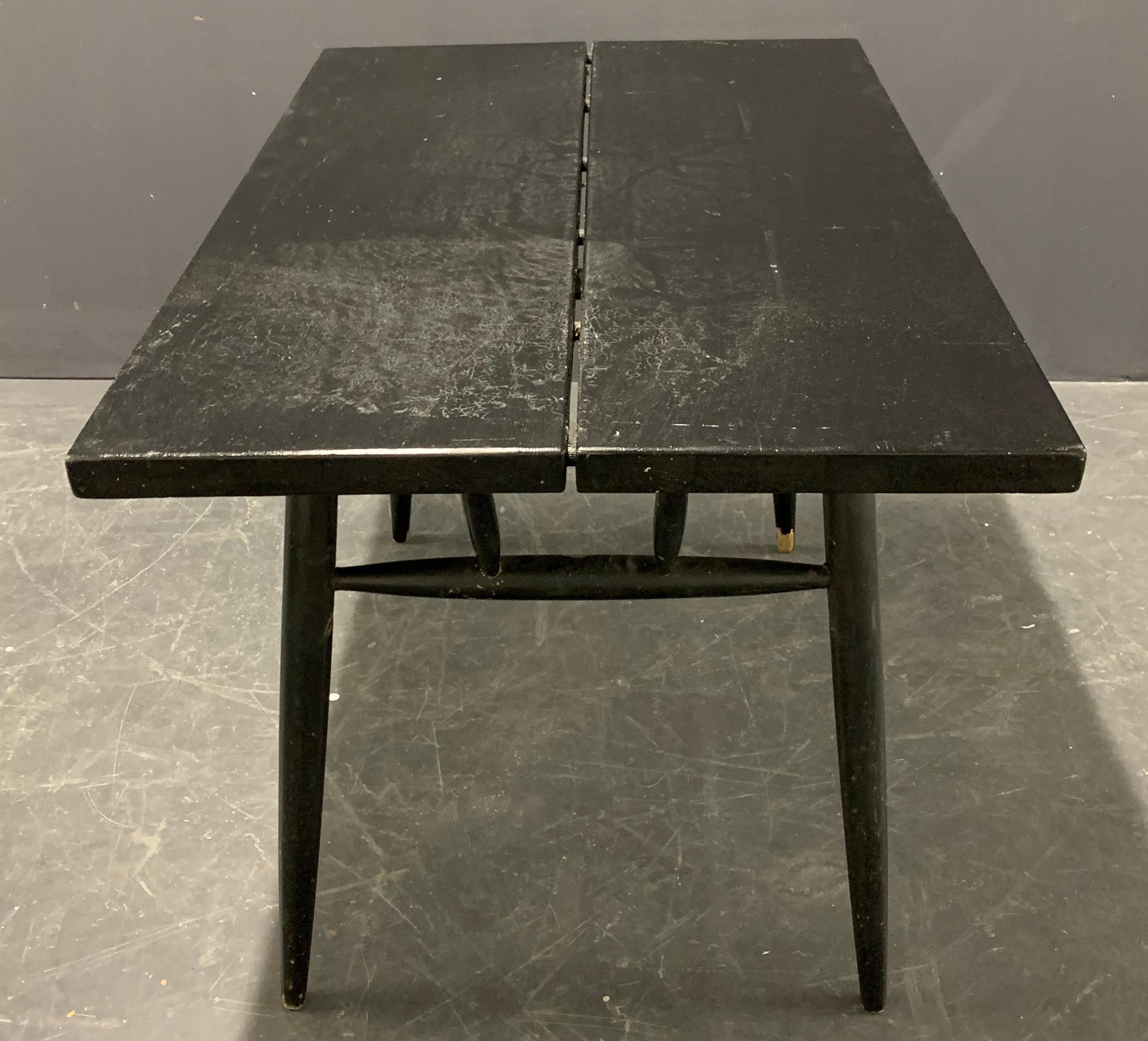 Very early version in rough, worn and later painted condition. Can be used as is or be restored to like new condition as this table is an rare example of a massive wood design piece.