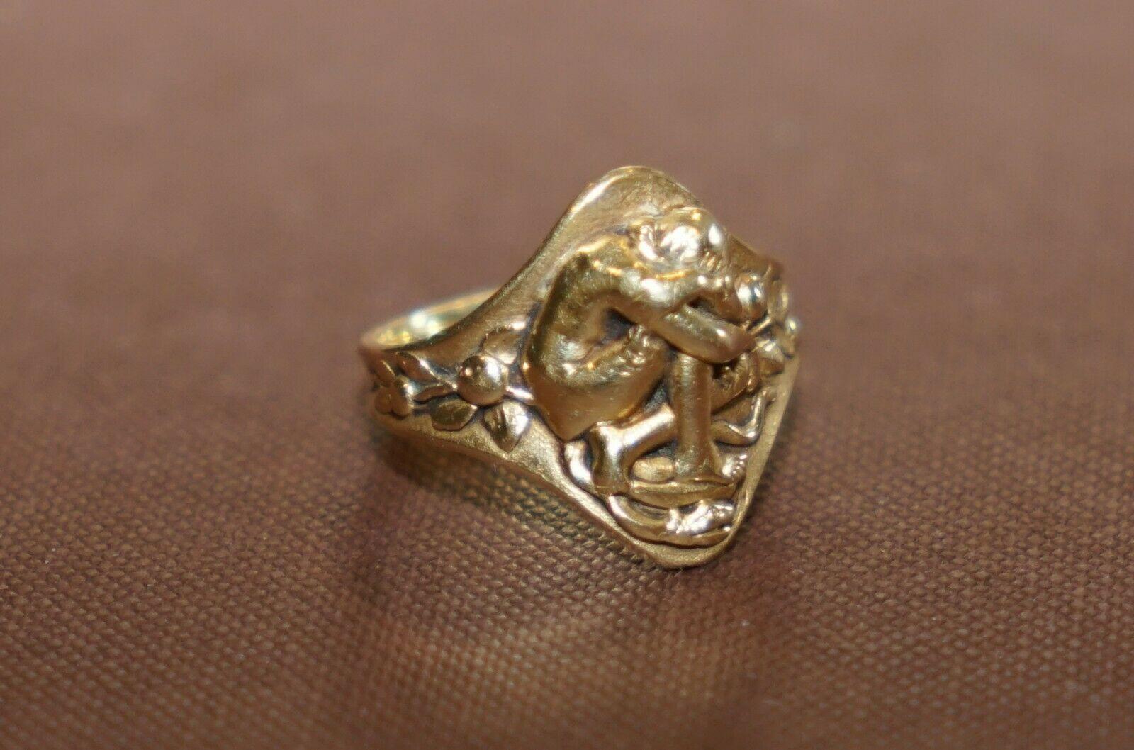 Wimbledon - Furniture are delighted to offer for sale this incredibly rare original Art Nouveau French solid gold ring on Eve in a crouched position with the serpent at her feet and the forbidden fruit either side attributed to the great Paul