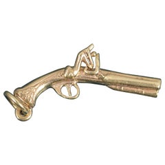 Raro ciondolo con pistola d'epoca in oro giallo massiccio a 9 carati o charm