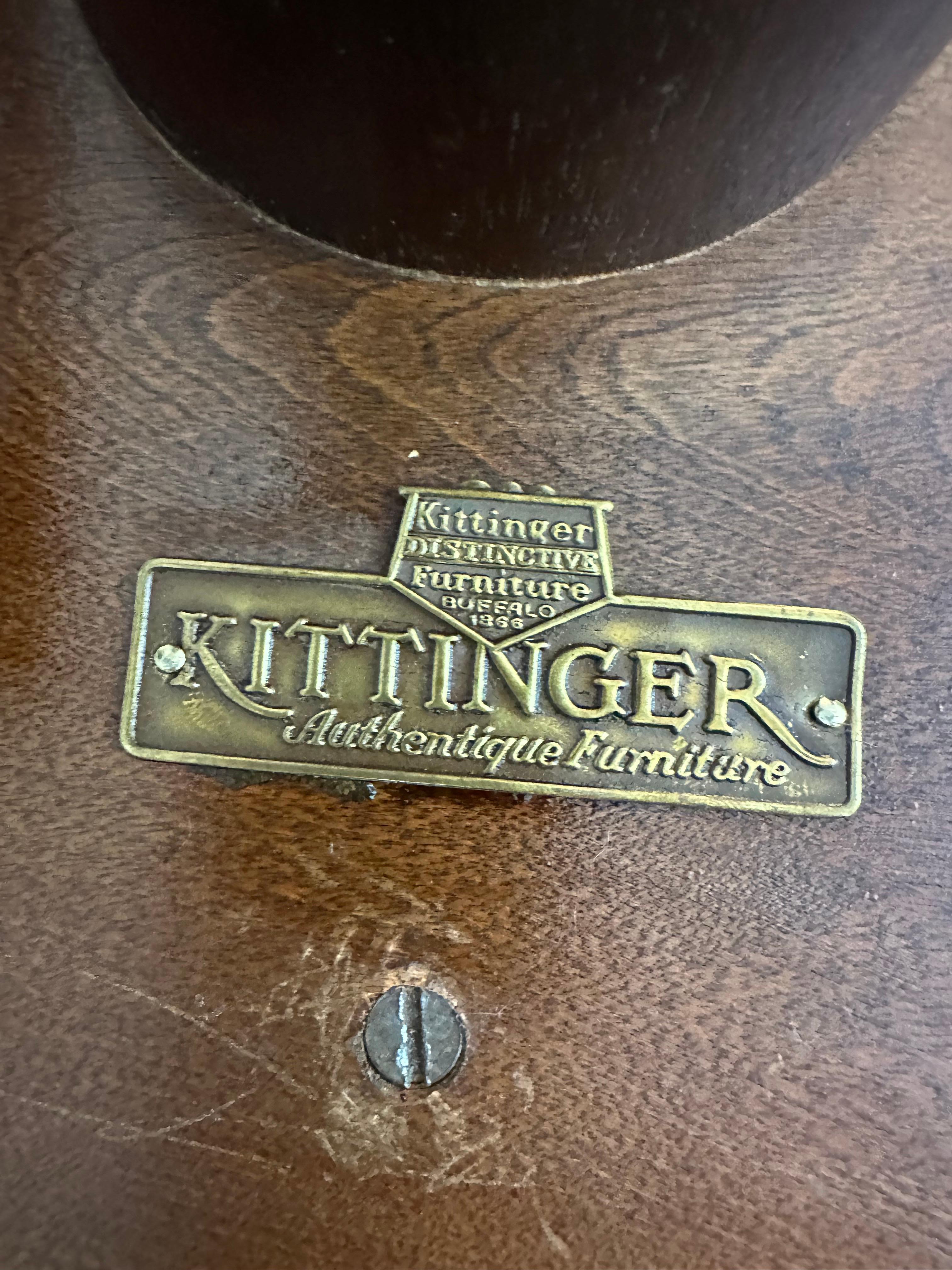 Kittinger of Buffalo was one of America's finest and first mass production companies that specialized in crafting fine recreations of American and English antiques. This stunning mahogany dininh table has a fine old original surface and will show