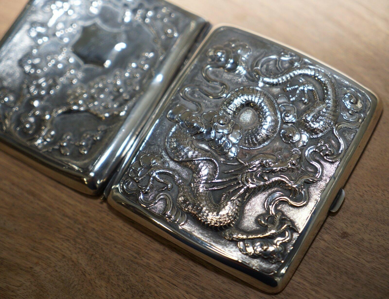 Wimbledon-Furniture

Wimbledon-Furniture is delighted to offer for sale this lovely solid silver Meiji period circa 1870 dragon embossed cigarette case with gold gilt internals

If you’re looking at this piece then you know exactly what it is, it’s