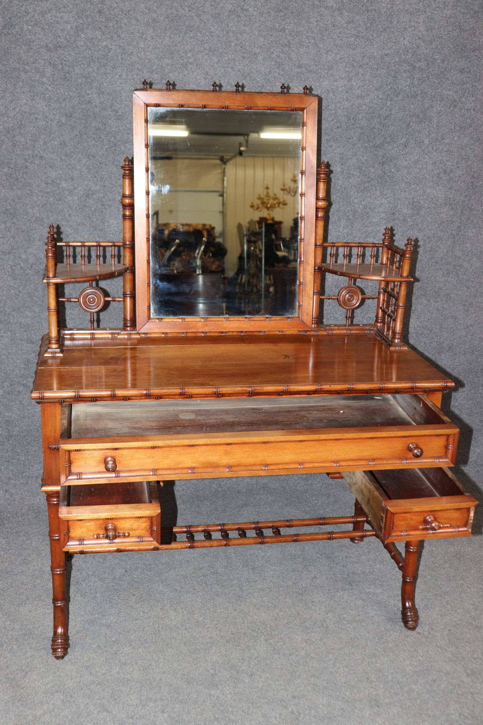 This is a very rare and beautiful walnut vanity attributed to R.J. Horner of NY. The reason we believe this is because of the secondary woods used on the drawers which are not European. If it was French the secondaries would likely be oak but here