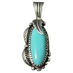 Raro colgante de pluma de turquesa de ley del suroeste de Carol Felley