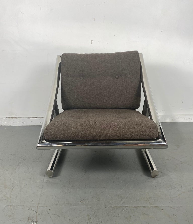 Rare Space Age, modernist chromed steel lounge chair by Plato Ginello, Italy. Truly amazing sculptural, architectural design. Superior quality and construction, retains original heather brown wool button tufted seat and back cushions, Extremely