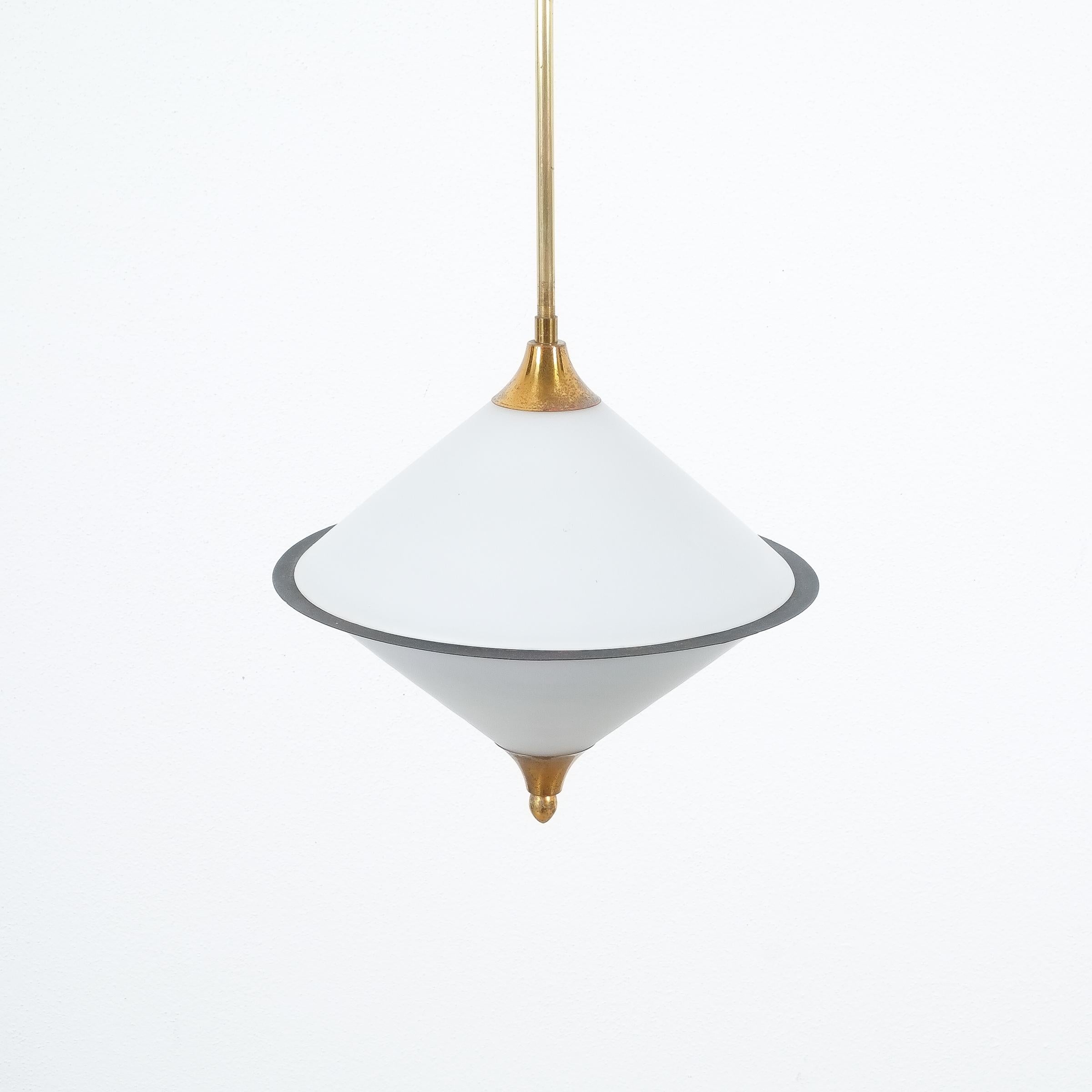 Rare spin top shaped pendant lamp opal glass attributed to Lelli, circa 1950

Beautiful opal glass light, circa 1950, Italy featuring a double conical glass shade made from two parts, divided by a thin blackened steel disc. It's in good condition