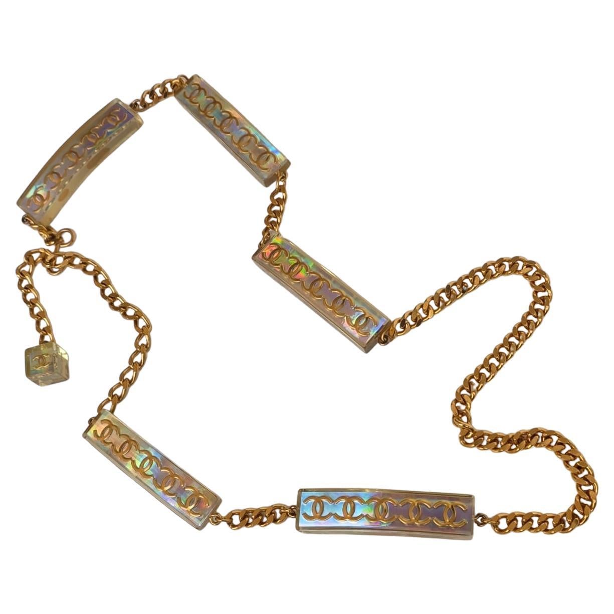 Rara cintura Chanel SS 1997 con catena olografica in acrilico