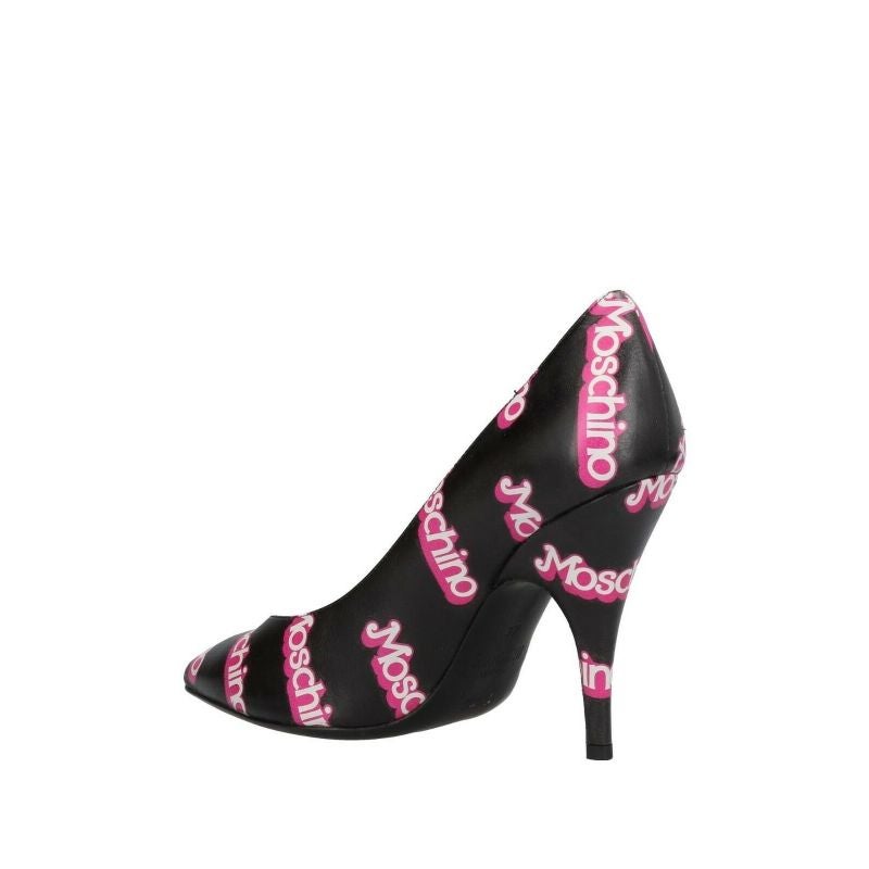 Rare! SS15 Moschino Couture Jeremy Scott Barbie Black Pink High Heel Pumps 36 IT

Additional Information:
Material: Calfskin       
Color: Black/Pink    
Pattern: All Over Barbie Moschino Logo    
Style: Classics
Size: 36 IT
Exact Heel Height: