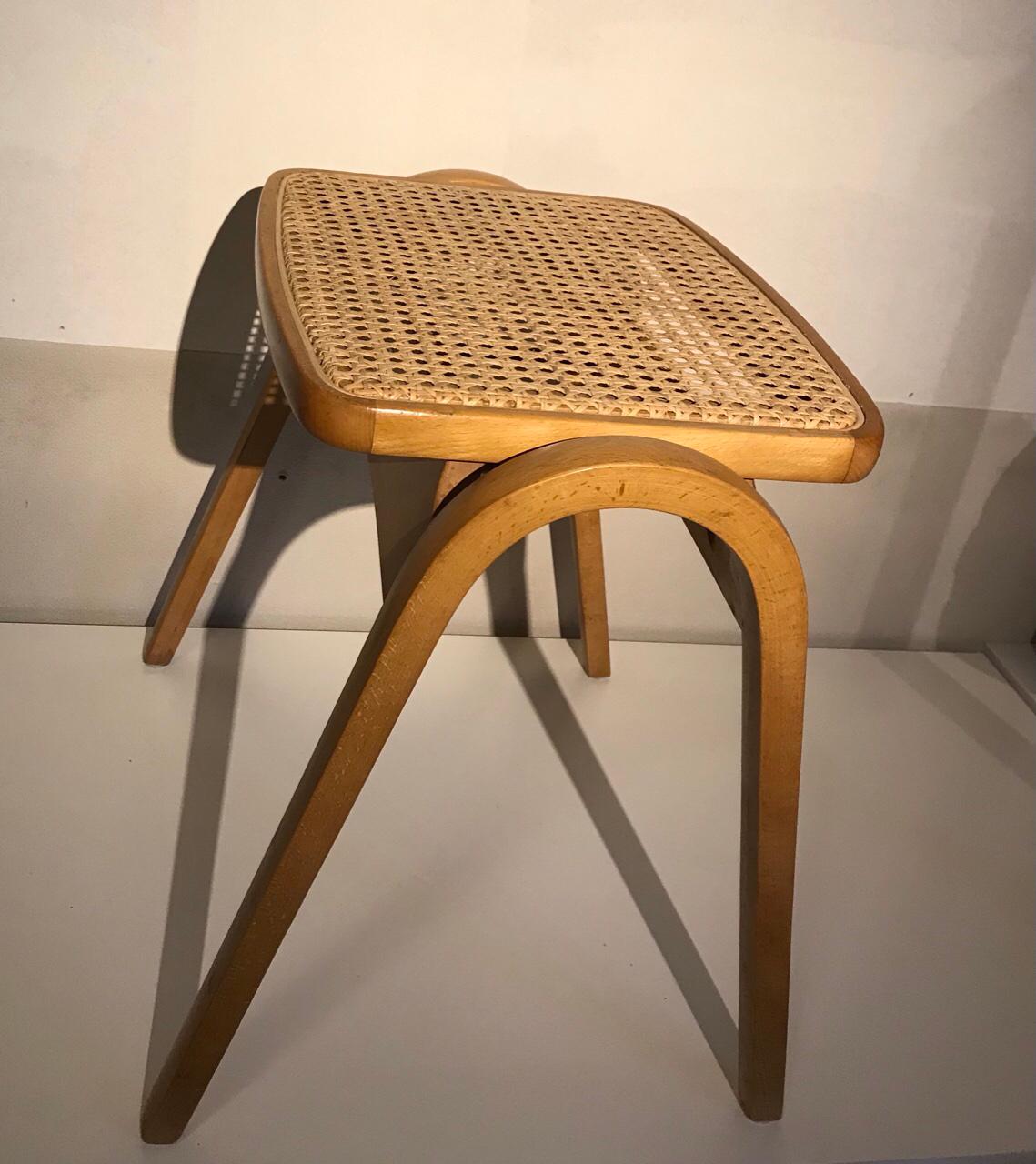 This is designed by the most talented Japanese mid-century producer Mr. Isamu Kenmochi in 1958.
This cane seating version has been produced by Akimoku from 1963 to 1987.
 