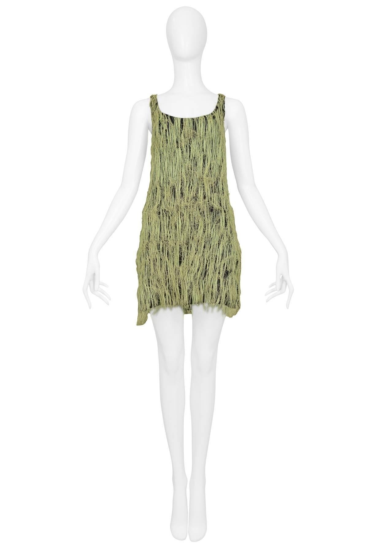 STEPHEN SPROUSE
Straw Dress 1988
Condition : Excellent Vintage Condition
Size : SMALL - Please inquire for measurements 
A very rare vintage Stephen Sprouse black sleeveless dress covered with yellow straw. Collection 1988. 